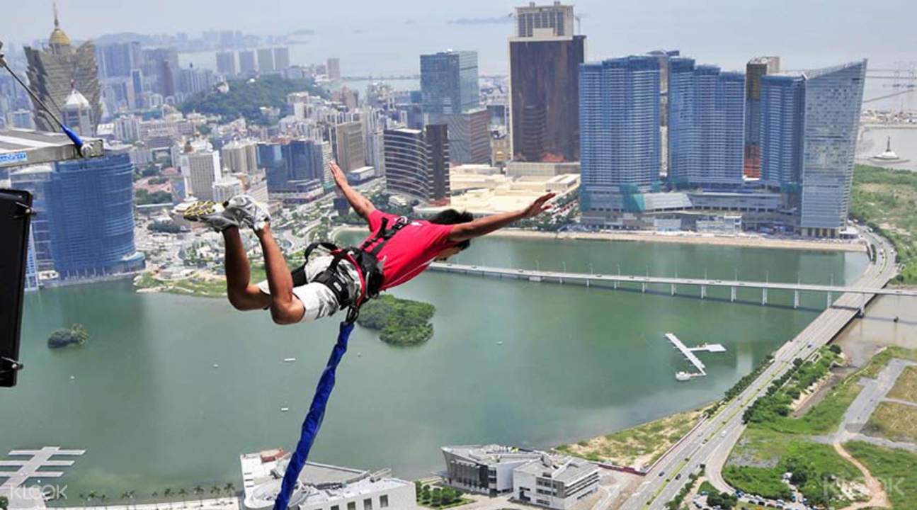 face your fears and jump from the very     of macau tower!