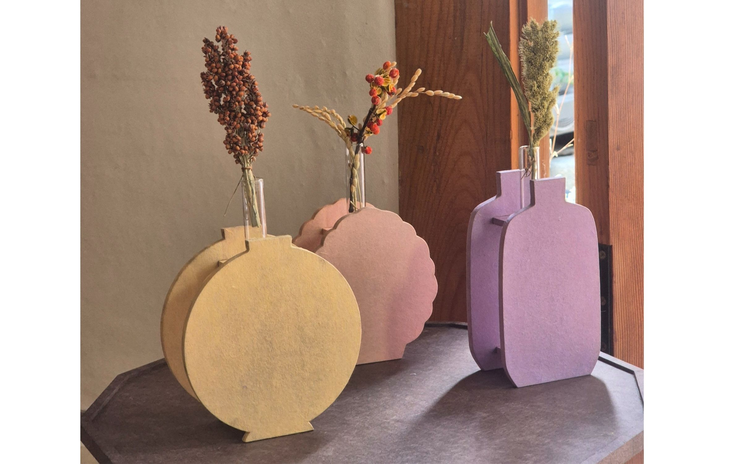 A decorative set with a glass tube for a single flower.
A popular handmade gift.