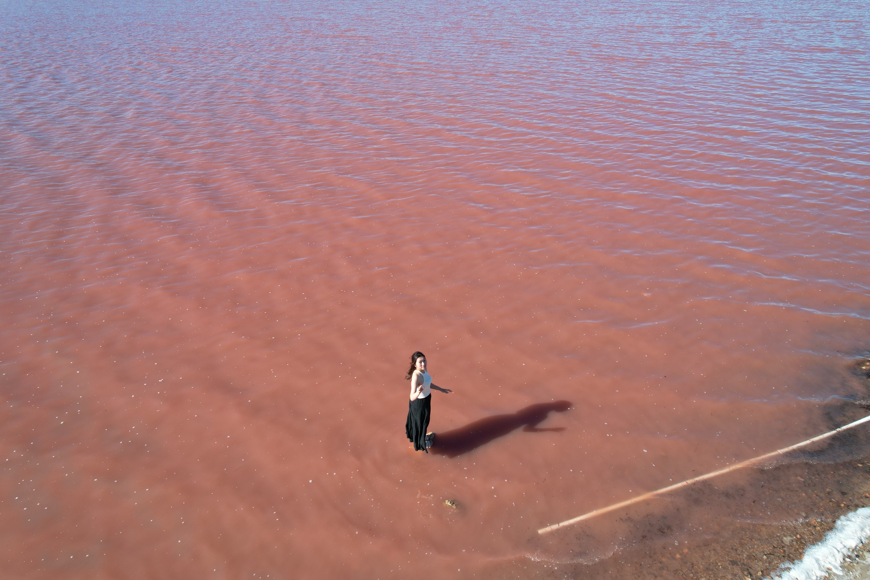 Visit the stunning Pink Lake, marveling at its unique hue and surrounding natural beauty