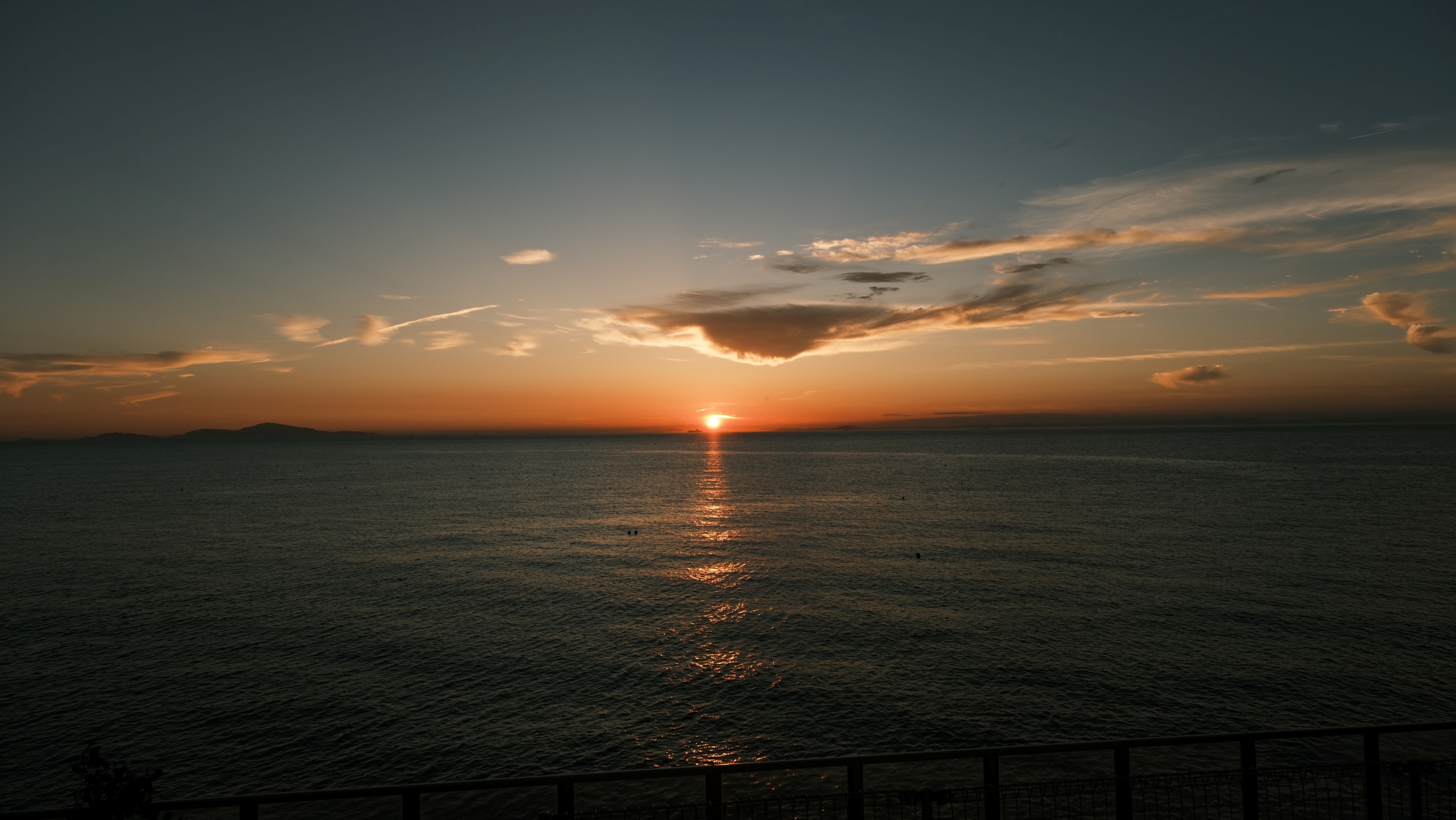 A wondrous staircase to the sky, a blissful ladder leading to the blue sea and sky, a feeling of being drawn into the heavens with every step.