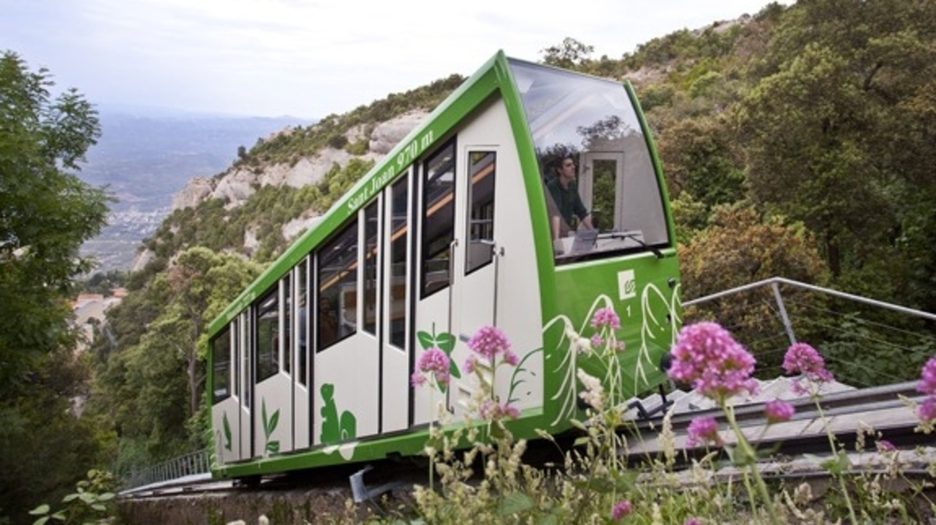 The Sant Joan funicular climbs steeply, offering stunning views of Montserrat’s rugged cliffs