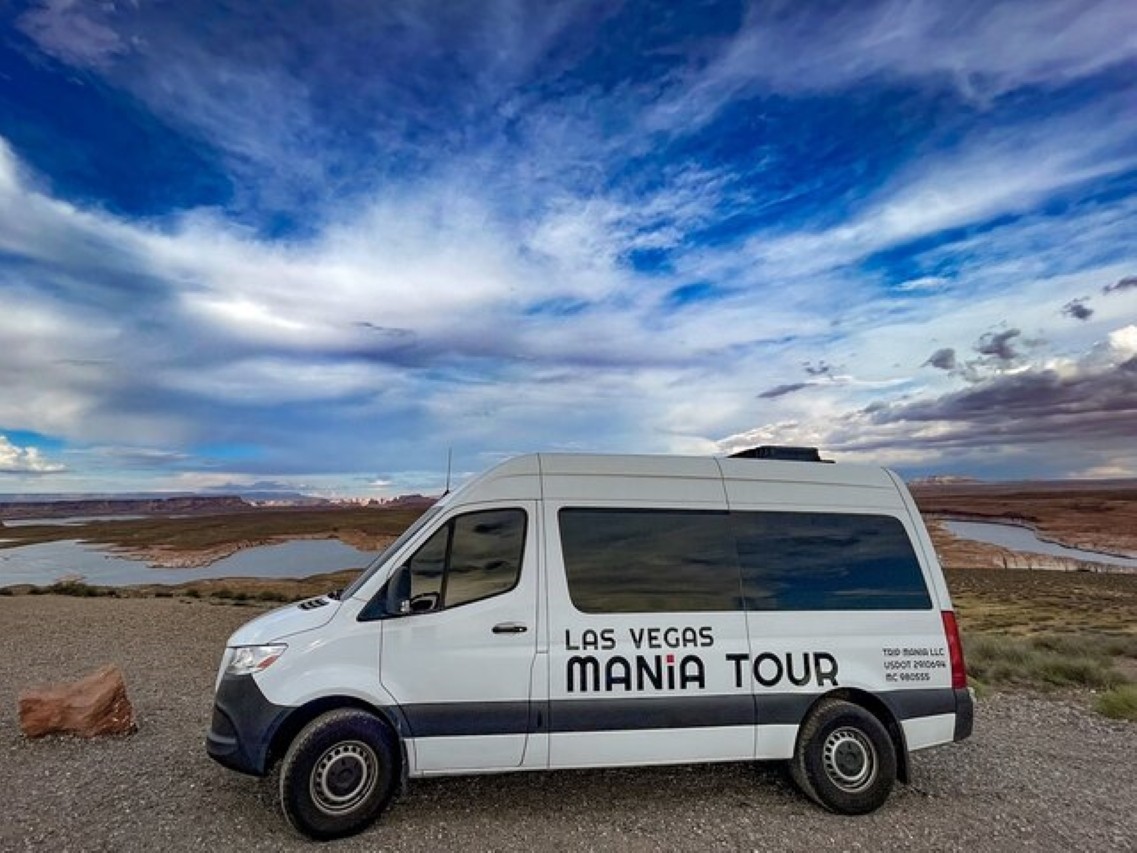 Ride comfortably through scenic desert roads in a spacious vehicle with panoramic window views