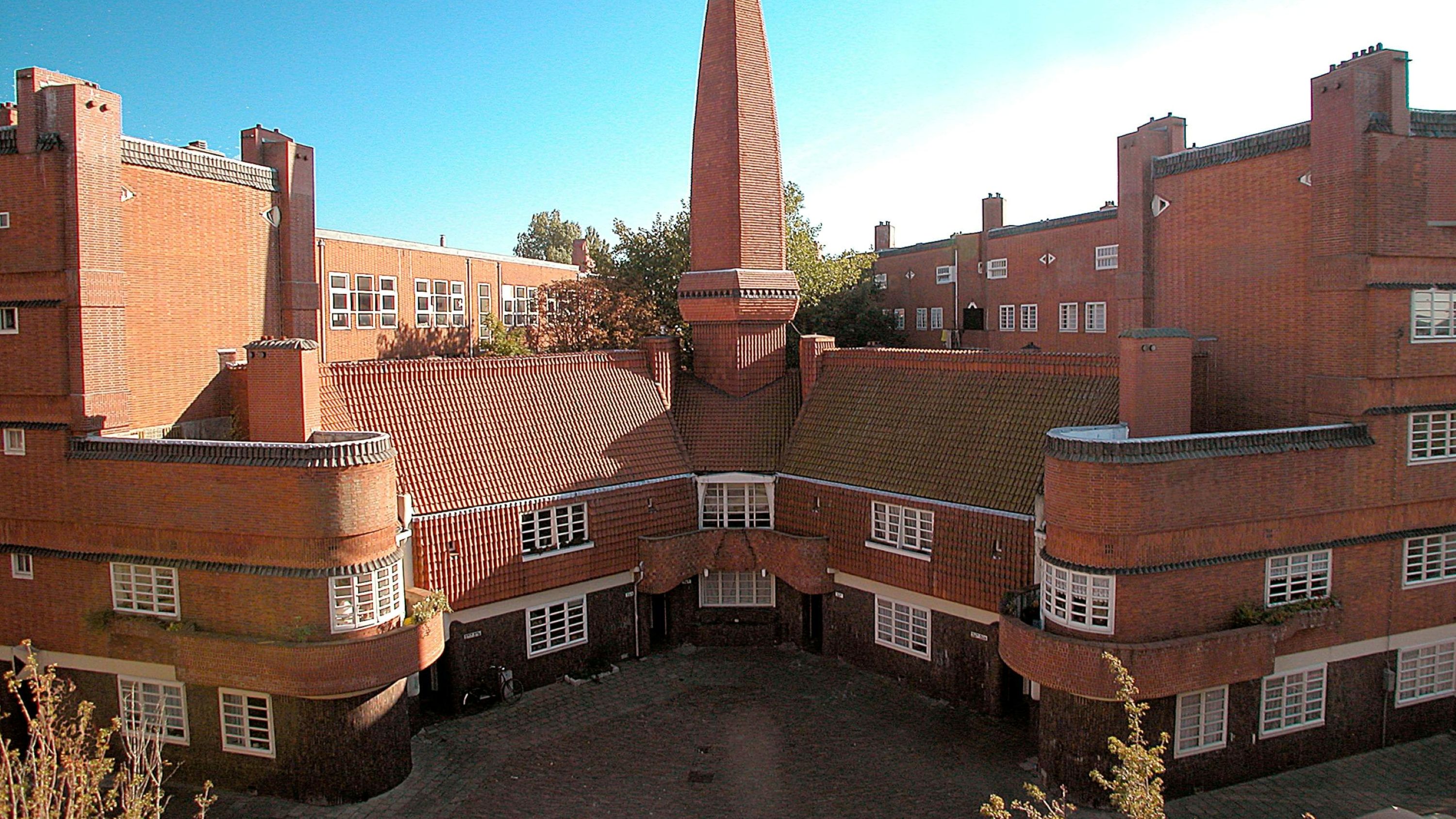 Discover the remarkable architecture of Museum Het Schip, a key example of the Amsterdam School style