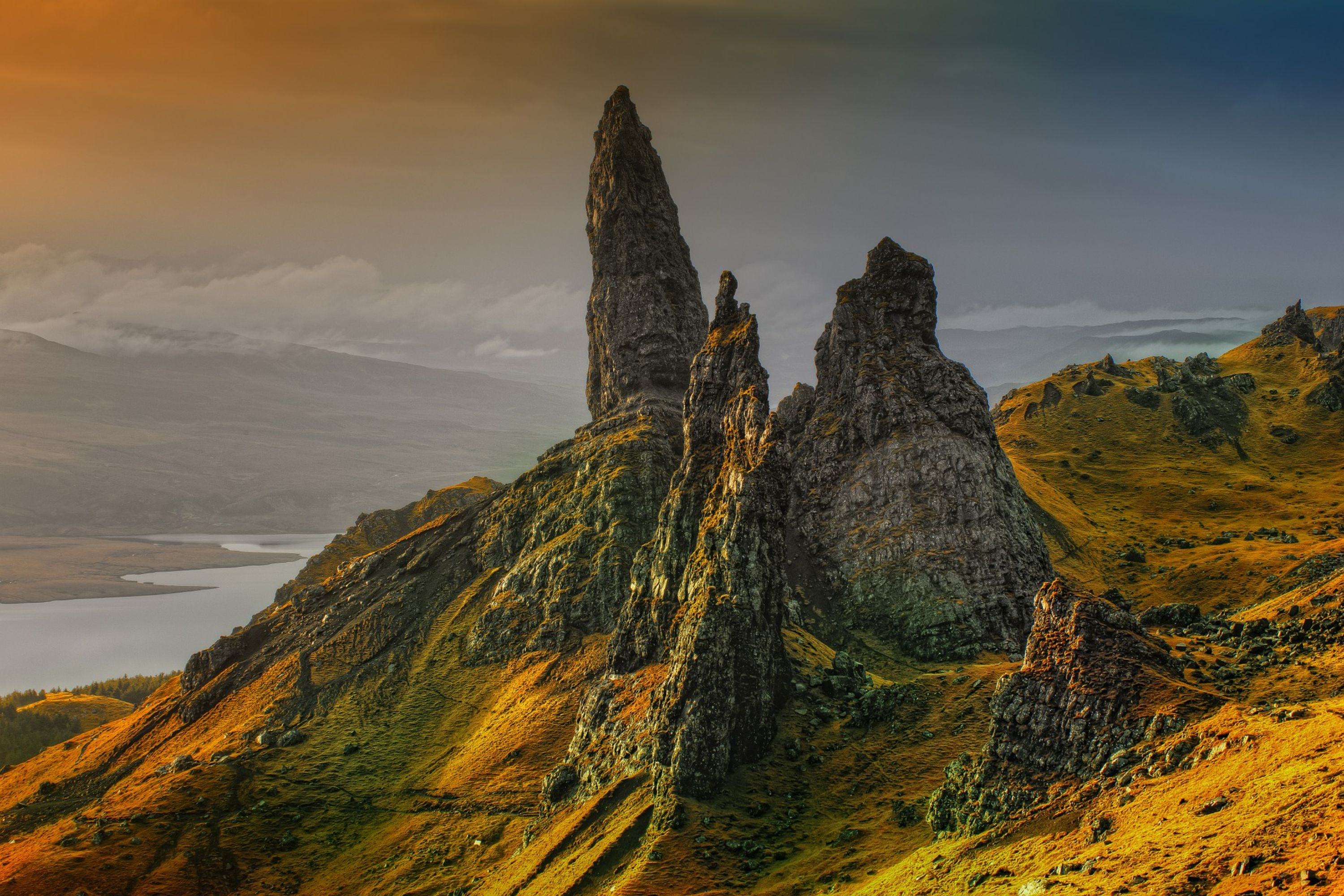 Hike to the Old Man of Storr, a famous rock formation with panoramic views over Skye