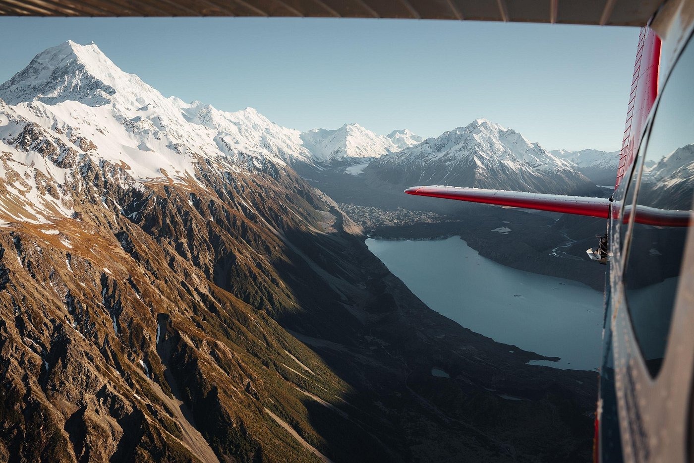 Experience breathtaking glacier landings and alpine views from ski plane and helicopter tours