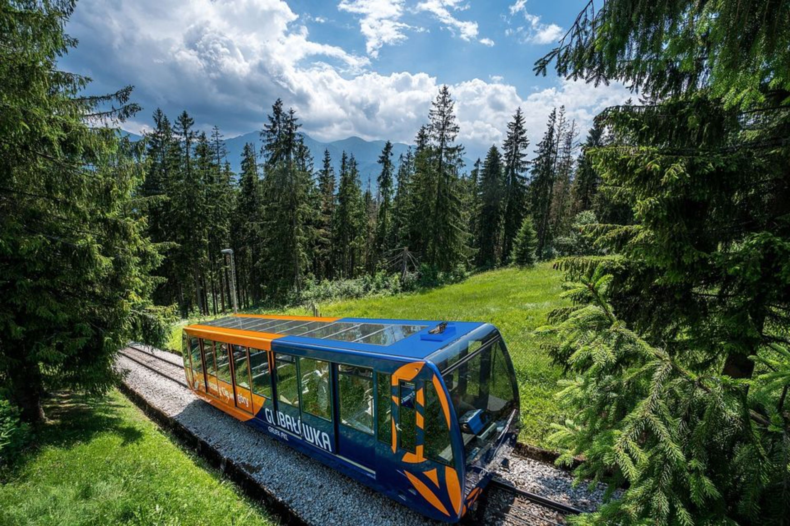 Experience the thrill of riding the funicular to the summit of Gubalowka for panoramic views