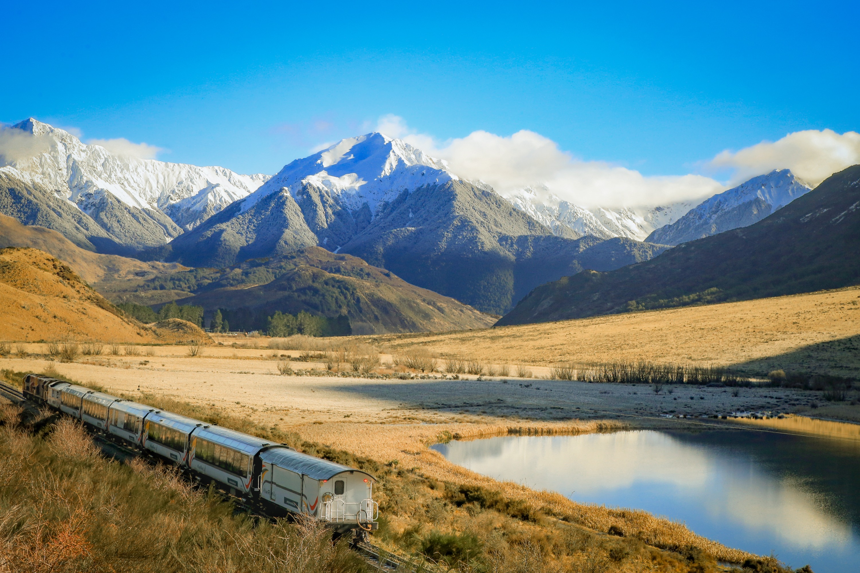 Cross soaring viaducts and traverse dramatic landscapes as you journey through the heart of the South Island