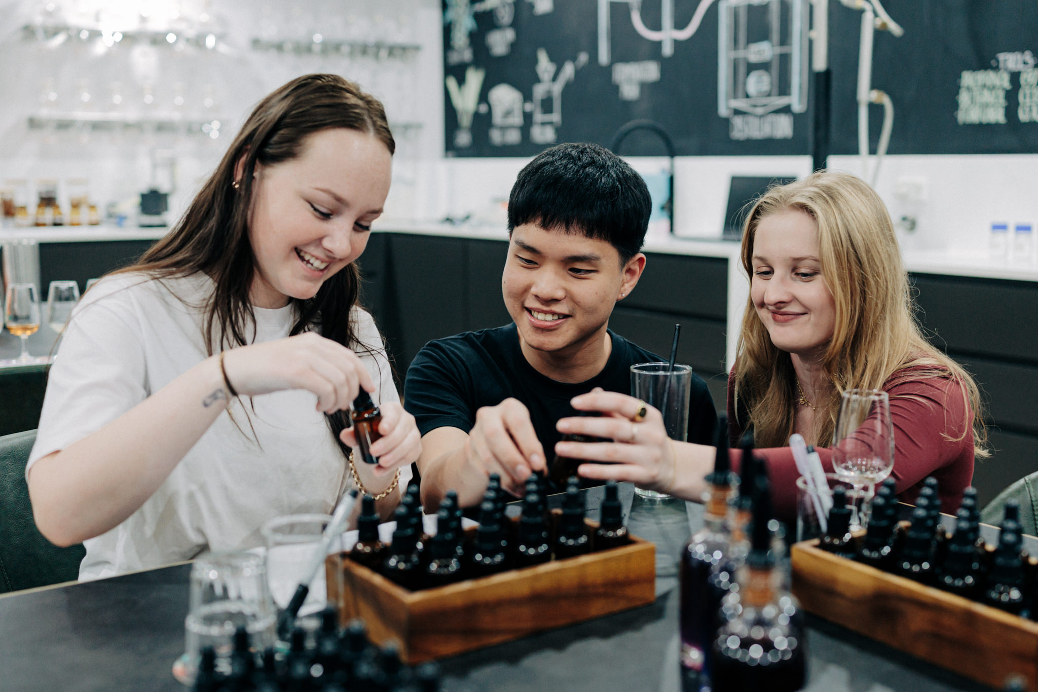 Explore the hands-on experience of crafting, bottling, and labeling their own gin, vodka, or rum