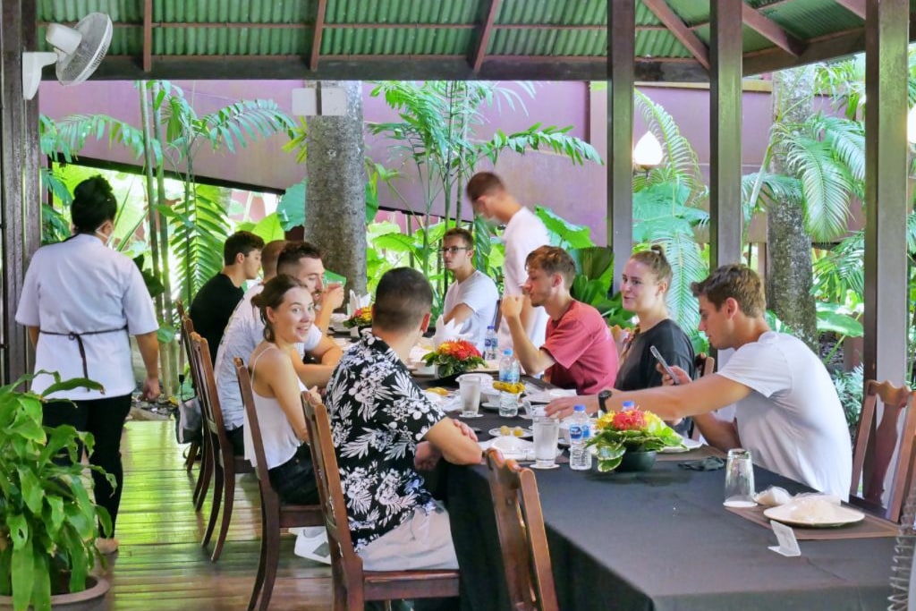Guests enjoying the food cooked by themselves together