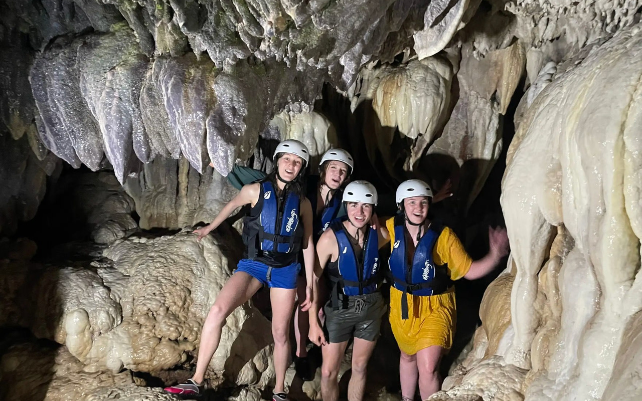 Whitewater Rafting with Cliff Jumping & Cave Exploration