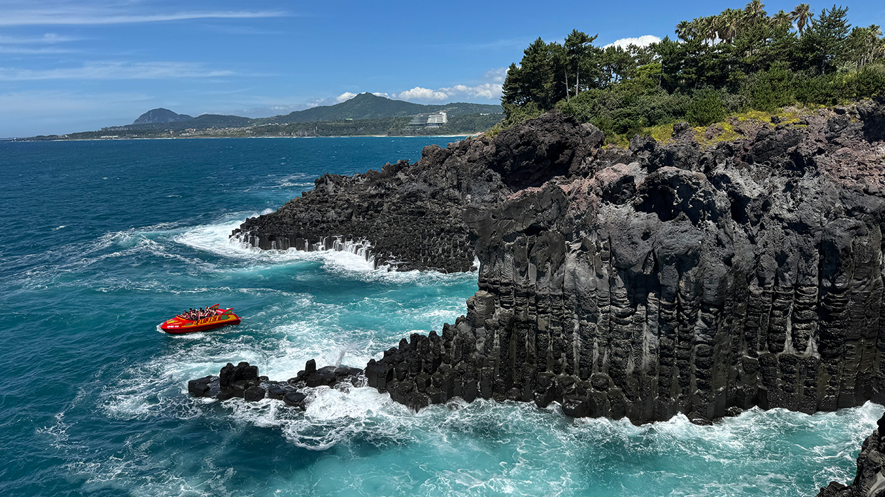 Towering hexagonal lava columns formed by volcanic activity, creating one of Jeju’s most dramatic and unforgettable coastal landscapes.