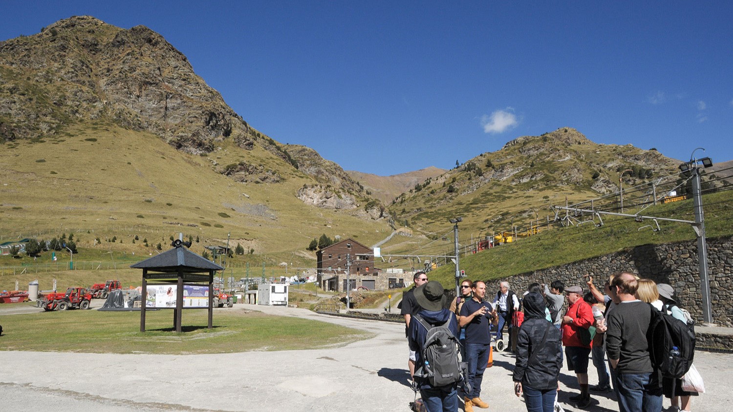 Learning about the stunning Pyrenees landscape with expert guidance under the clear mountain skies