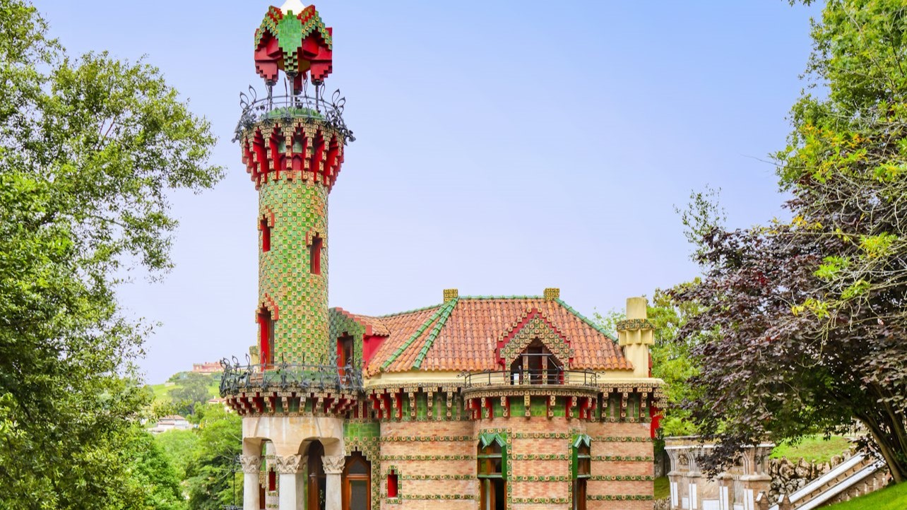 Iconic view of Gaudi's El Capricho, blending vibrant colors, nature-inspired design, and creativity