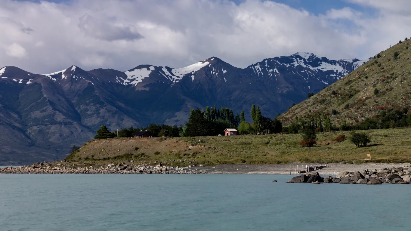 Unwind in Estancia Nibepo Aike's picturesque lakeside location, offering a tranquil Patagonian rural escape amidst stunning mountain vistas.