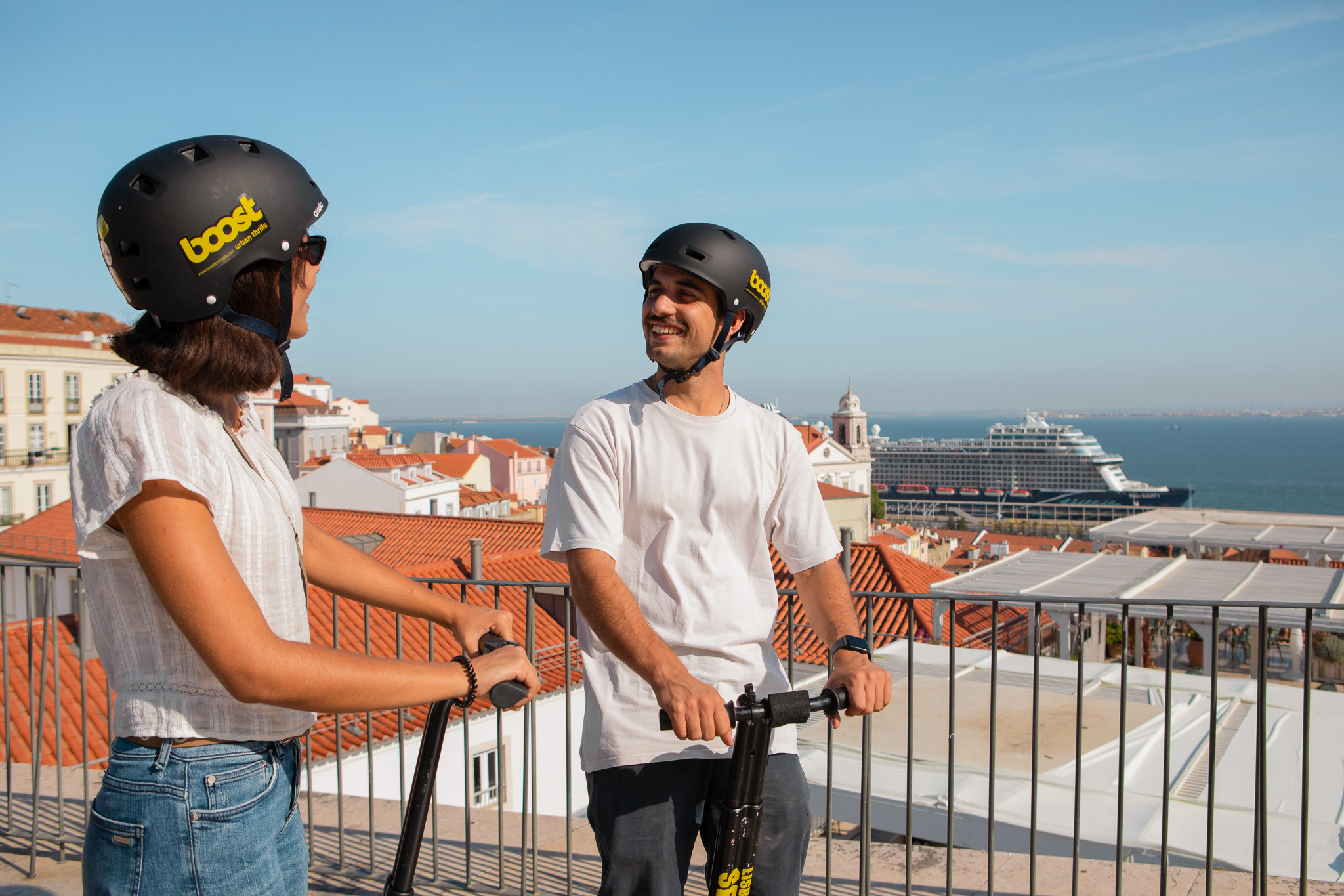 Segway Lisbon Guided Tour in Lisbon. Tourists heading to Portas do Sol viewpoint to gaze into the Tagus River.
