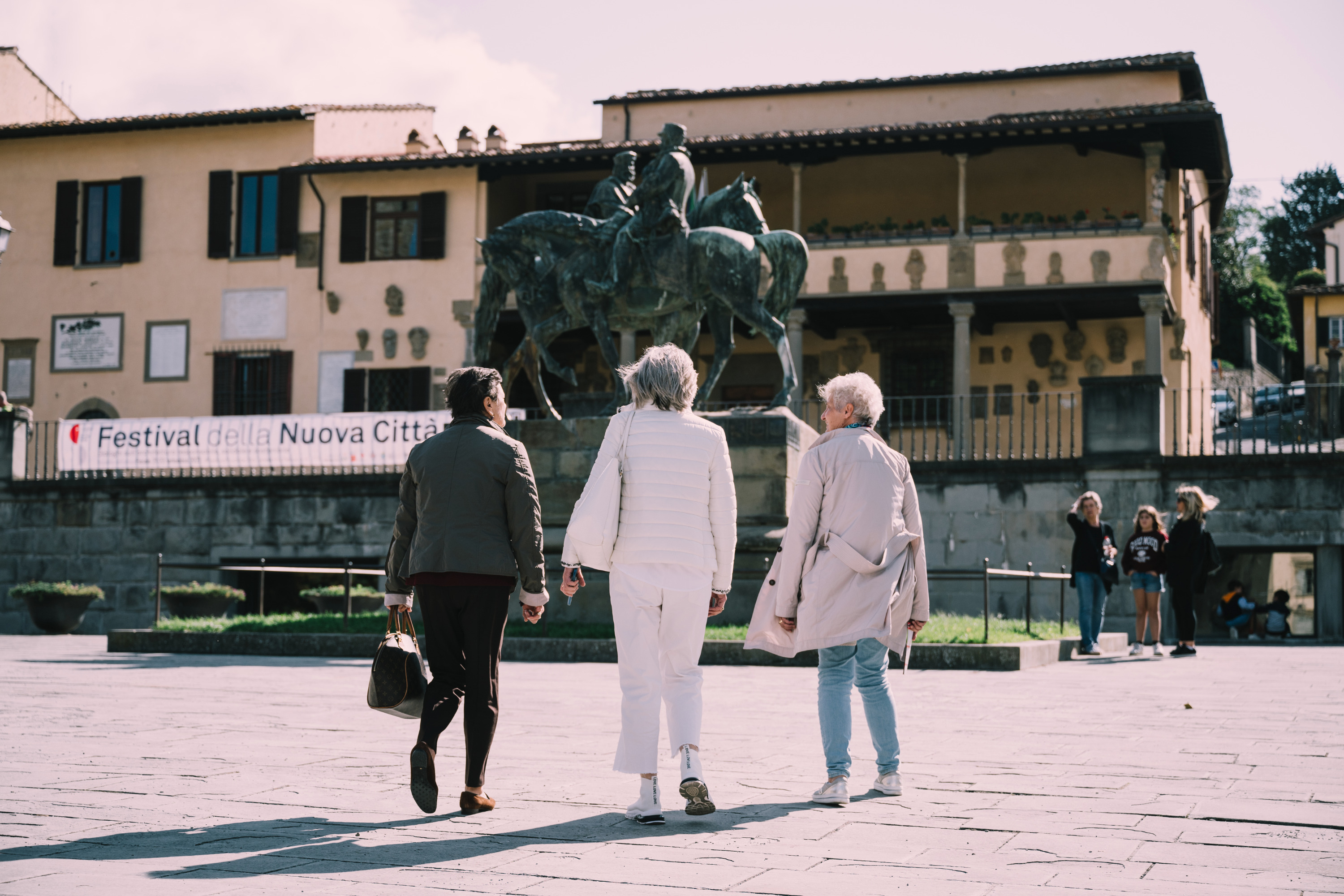 People looking at a statue