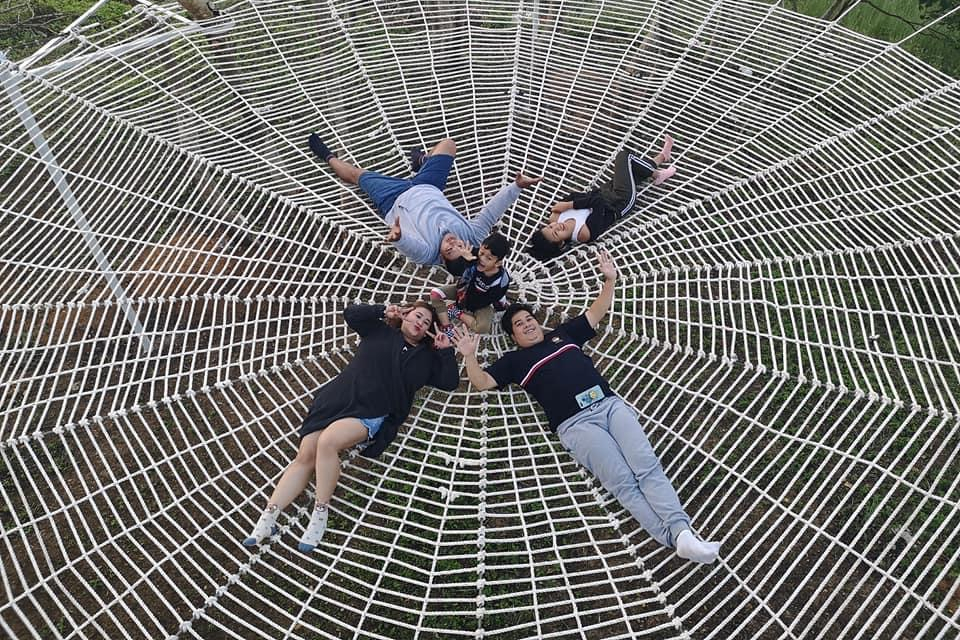 family on spider web