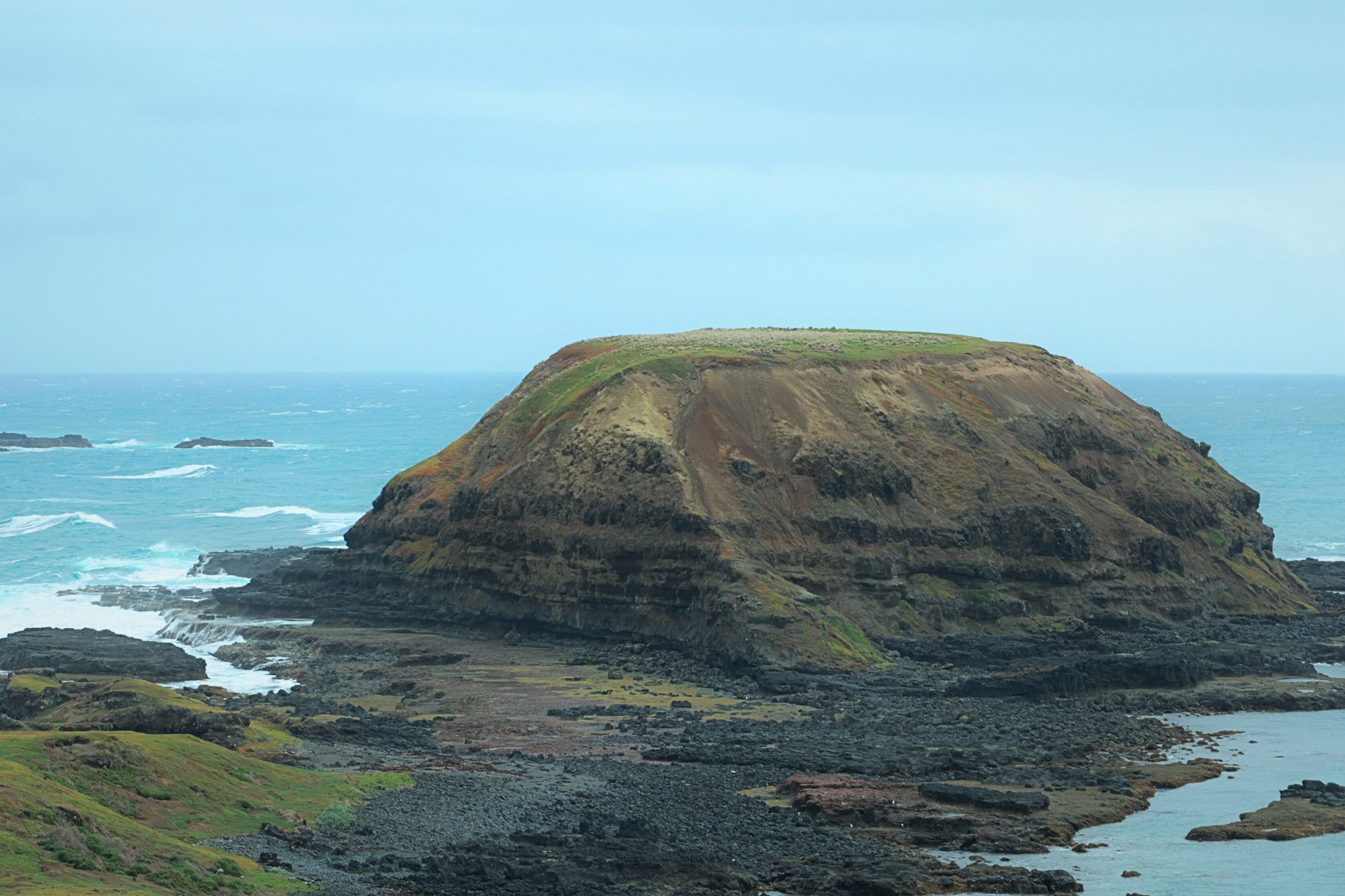Take in the stunning views of cliffs and blowholes at The Nobbies.