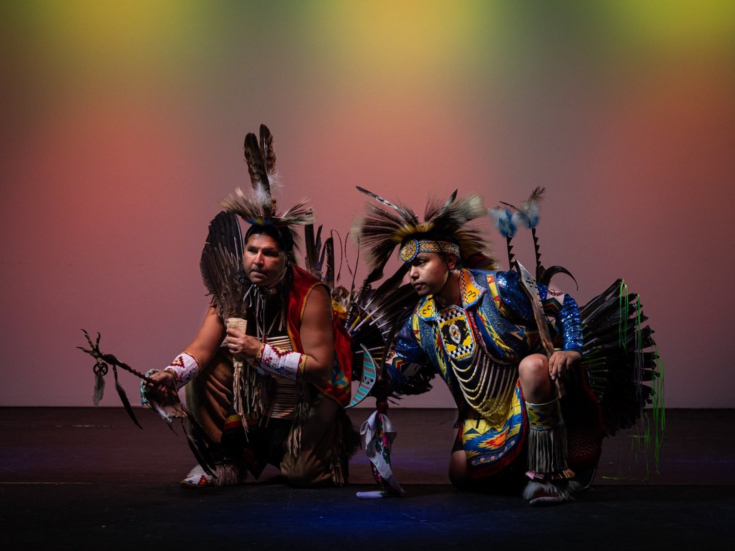 Show Northern Traditional dance gracefully, celebrating ancestral heritage through rhythmic powwow movements