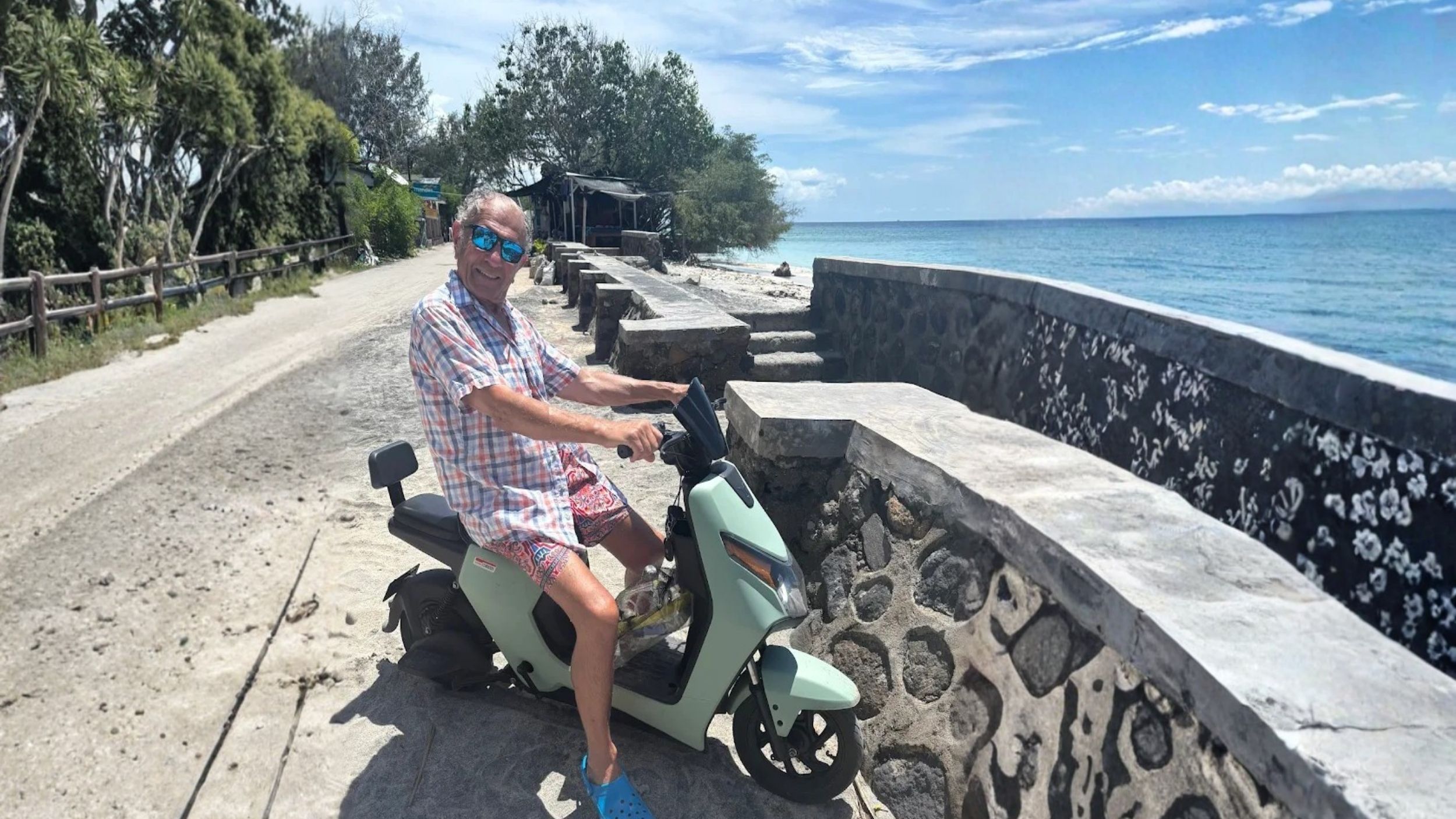 Enjoying a fun ride on an electric scooter by the beach in Gili Trawangan