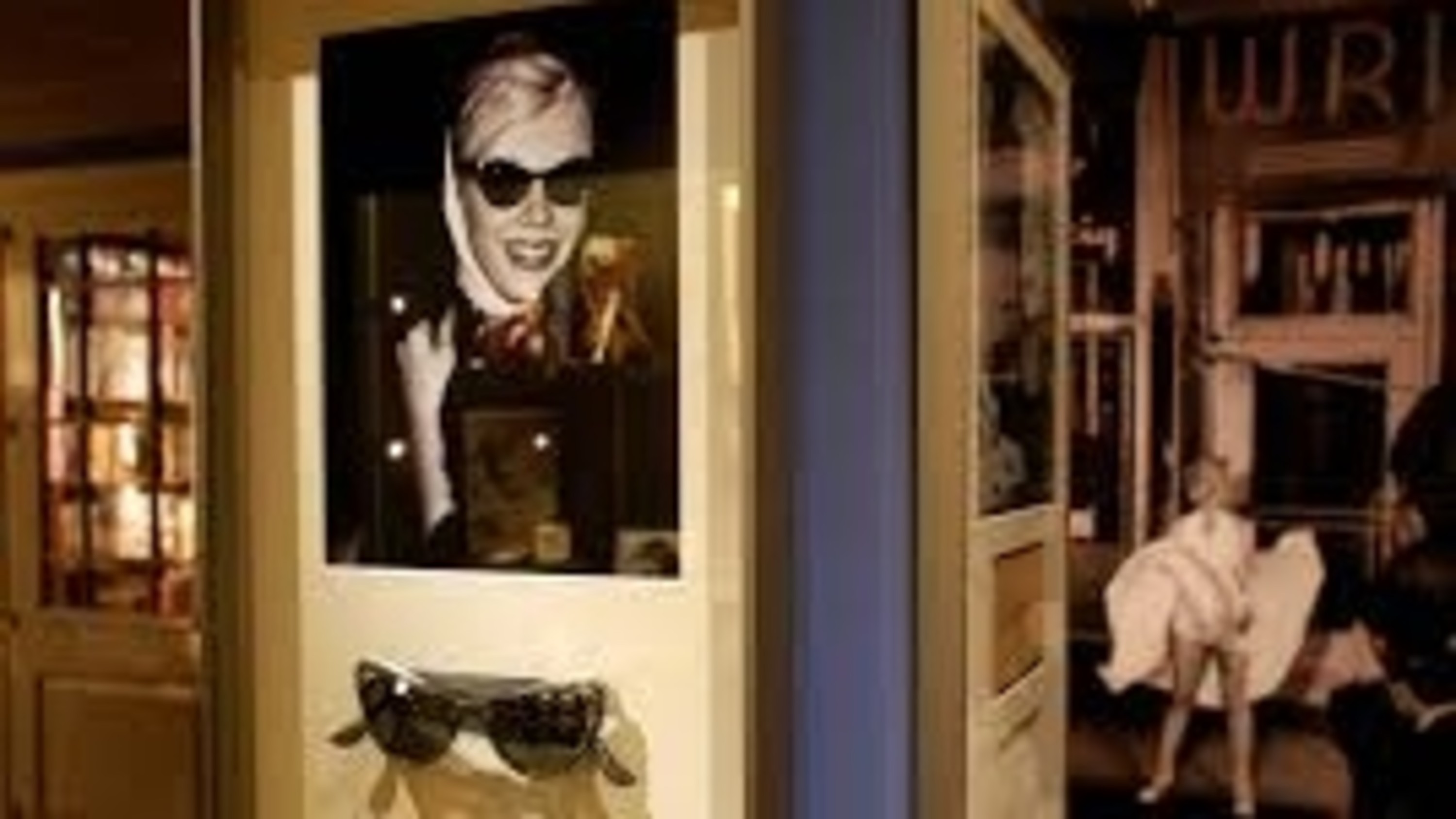 Iconic Marilyn Monroe photographs displayed on walls, capturing her timeless charm and cultural impact