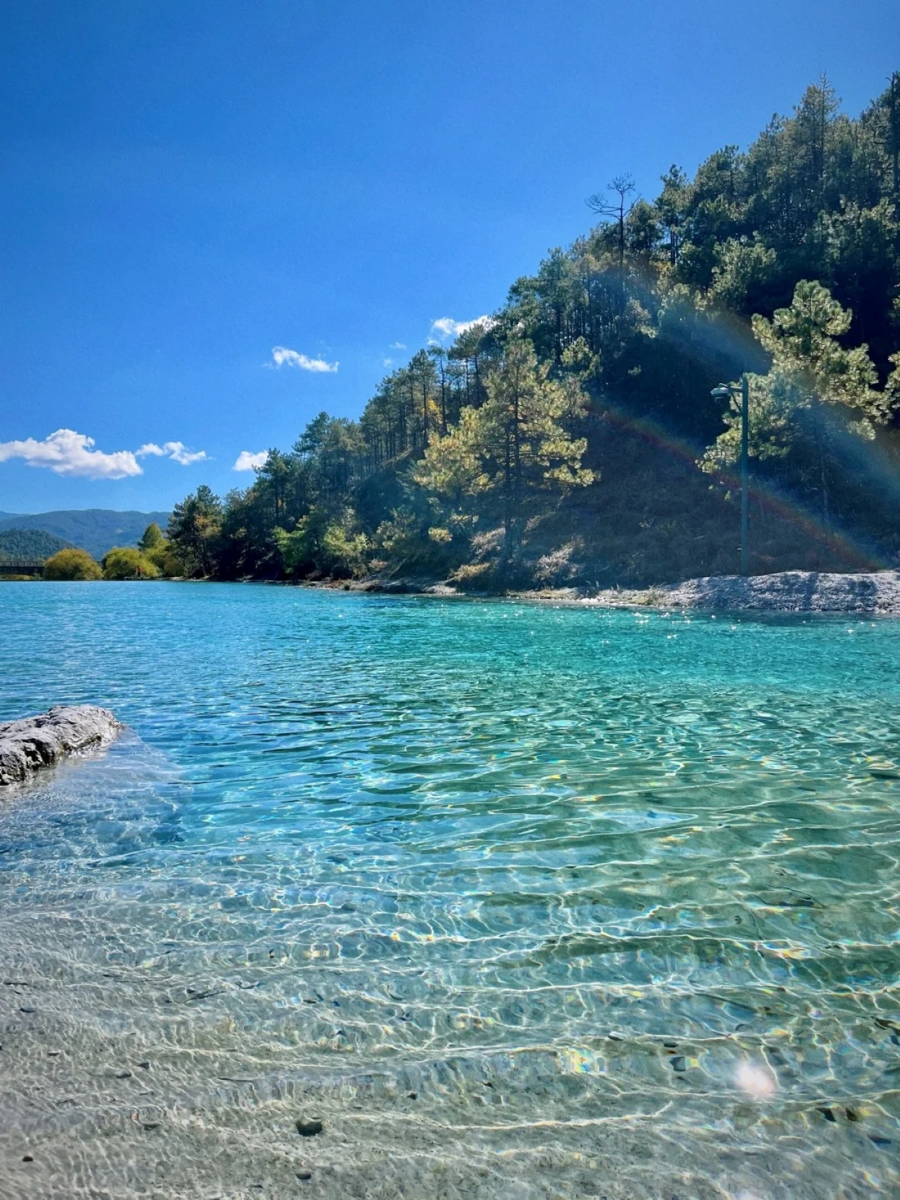 Its predecessor was the "Baishui River", named after the blue water and crescent-shaped valley.