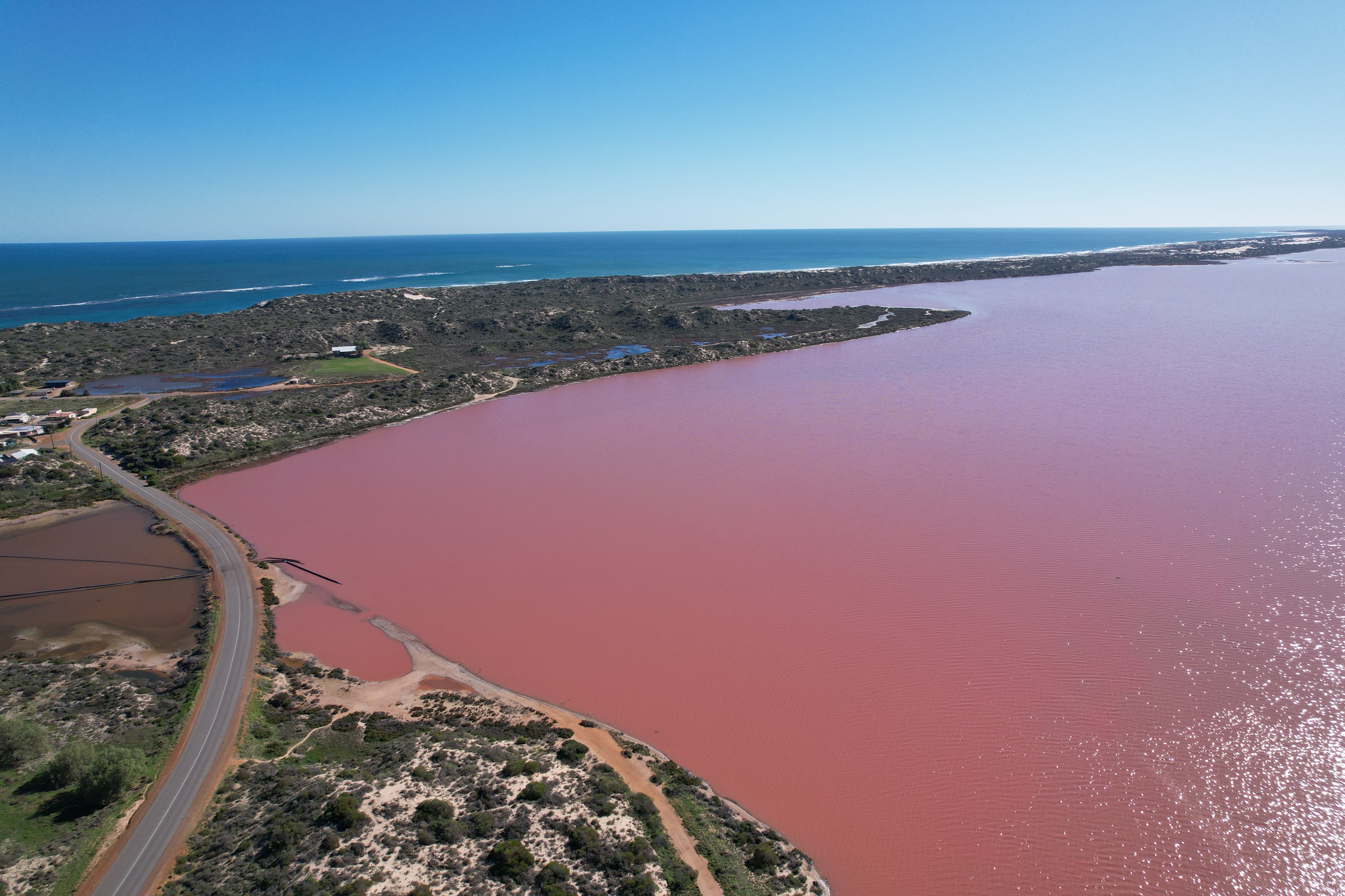 Capture breathtaking photos of the picturesque pink lake and its surroundings