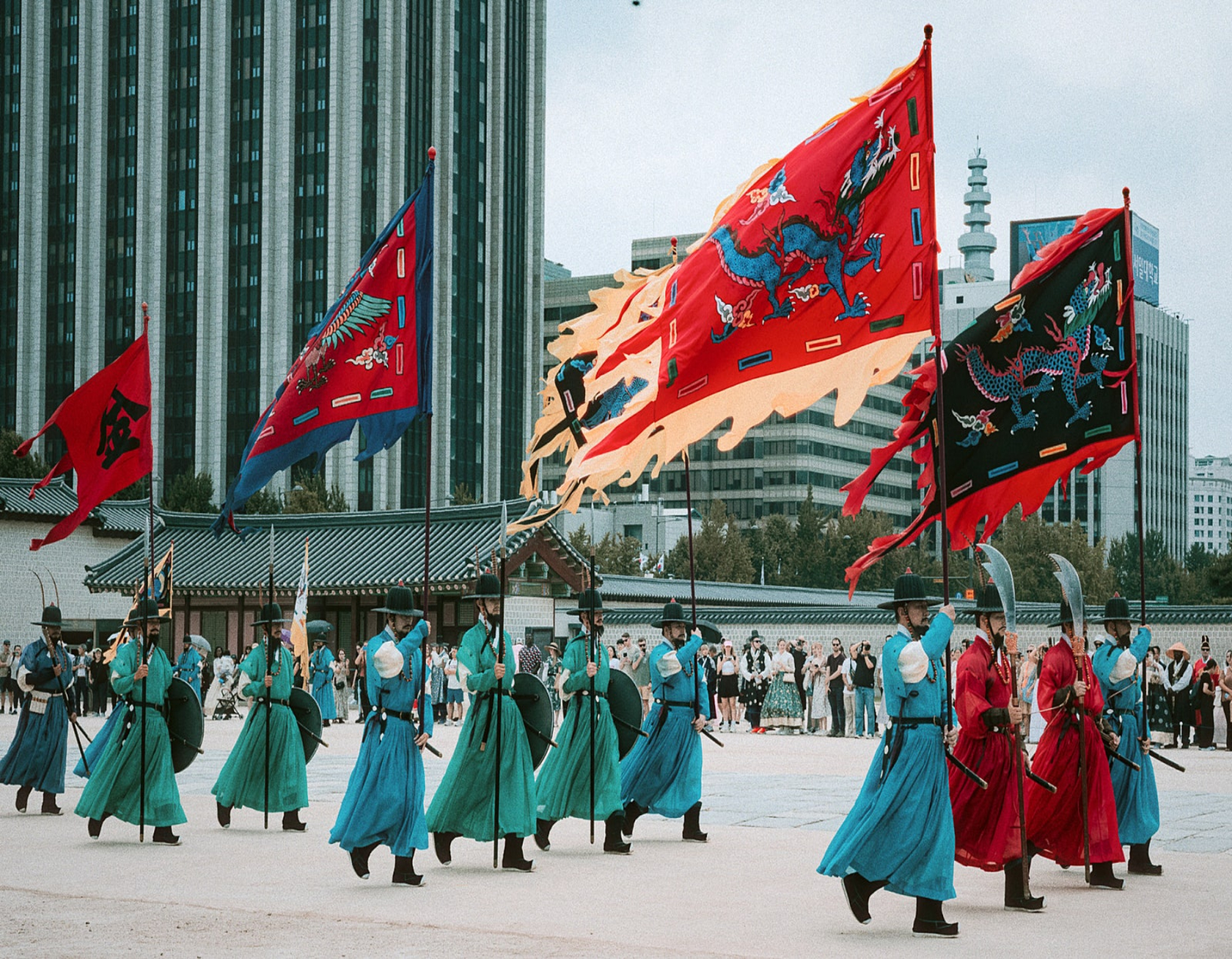 Immerse yourself in the essence of royal culture with a colorful parade of traditional costumes and flags.