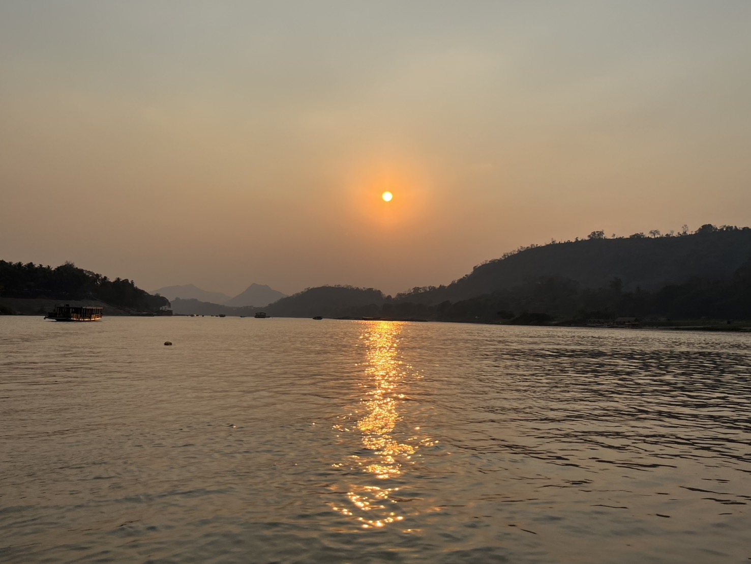 Sunset cruise on Luang Prabang river 