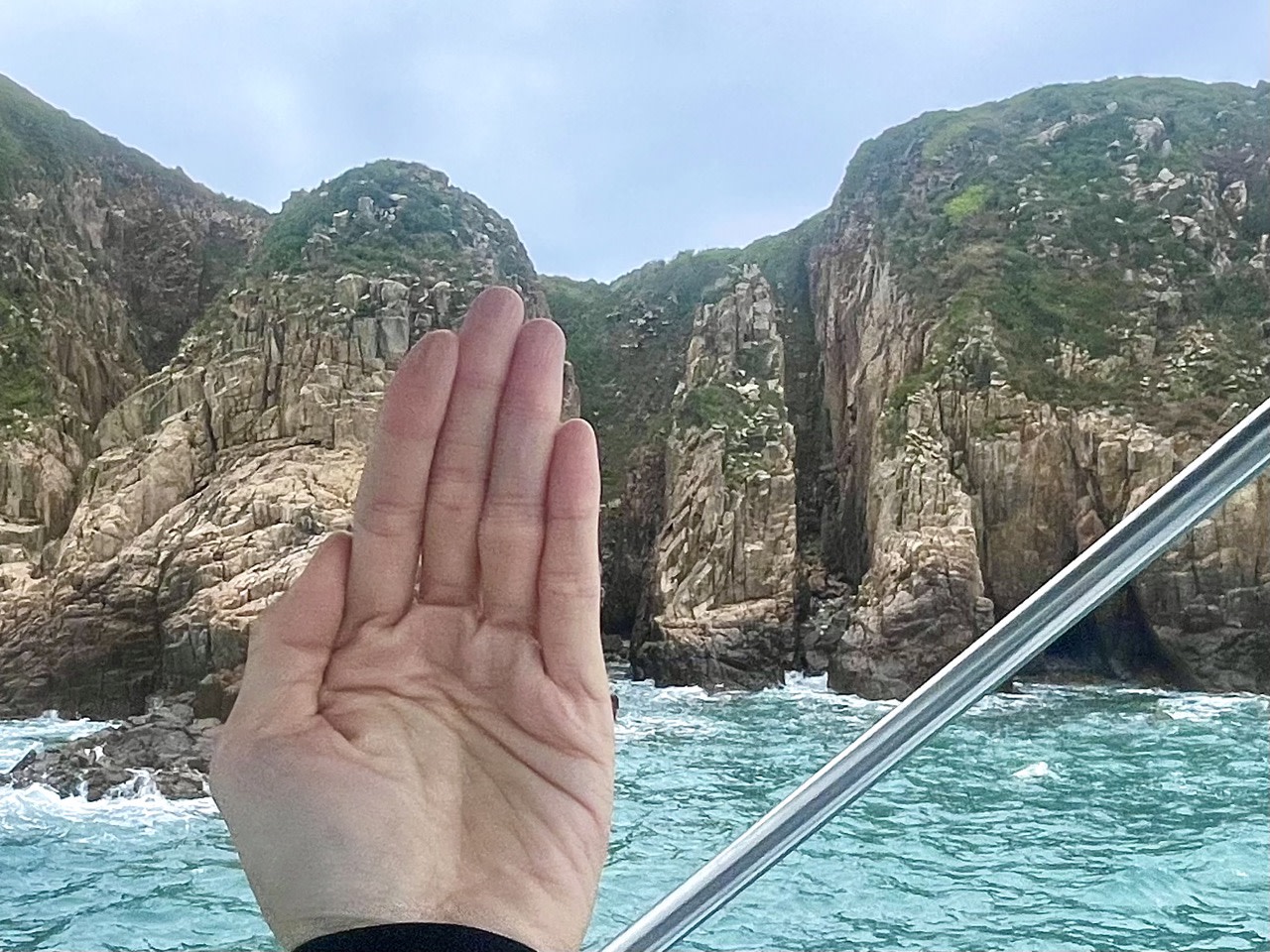 Praying Hand Cliffs, Bluff Island, Hong Kong UNESCO Global Geopark (Yacht Cruise through Four Sea Arches Volcano in Hong Kong)