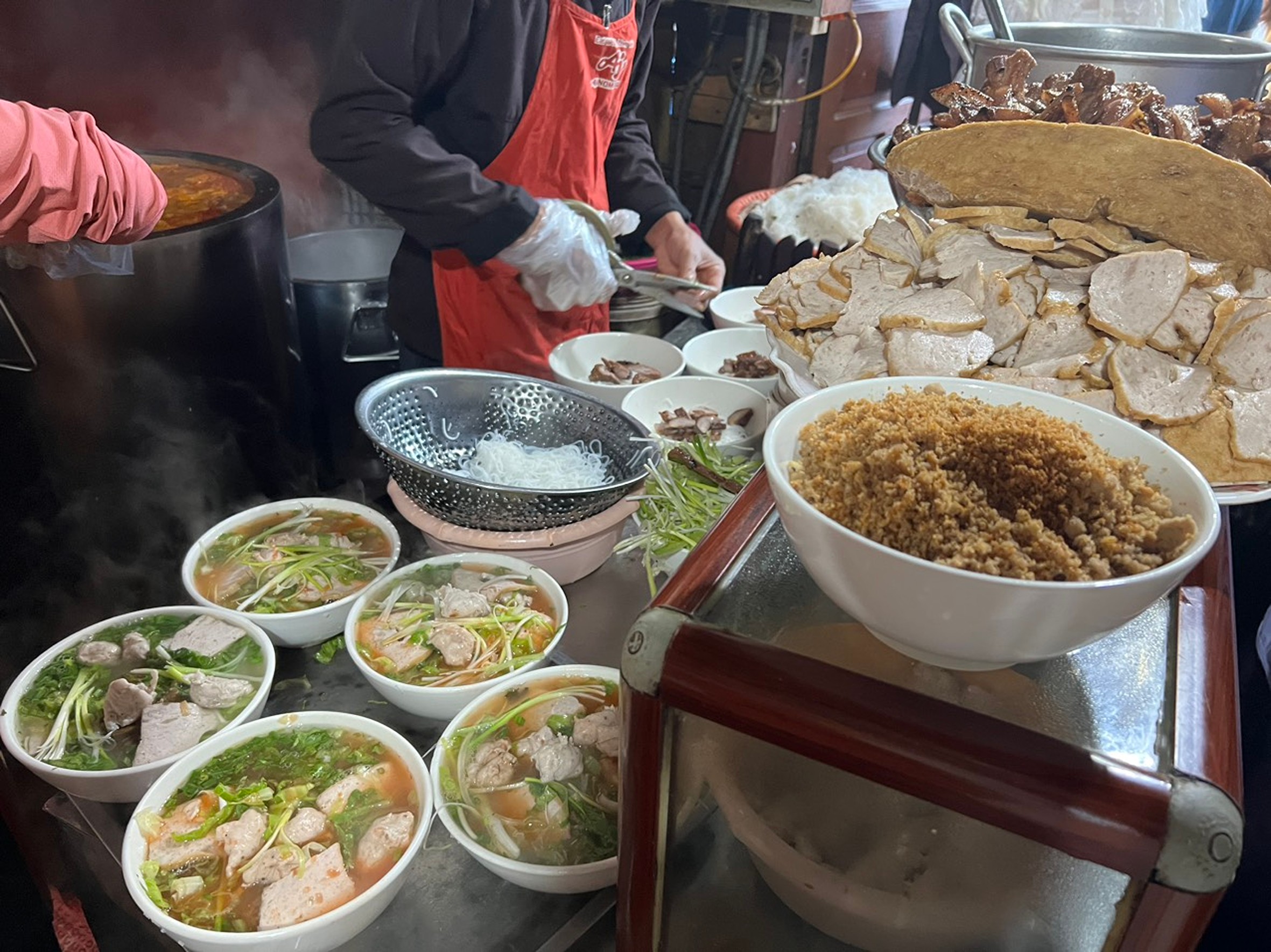 Bún Chả Chan, a hearty noodle soup served with grilled pork and fresh herbs