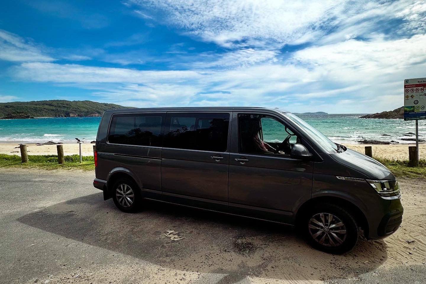 Travel comfortably in a mid-sized van with scenic windows and relaxing, smooth ride