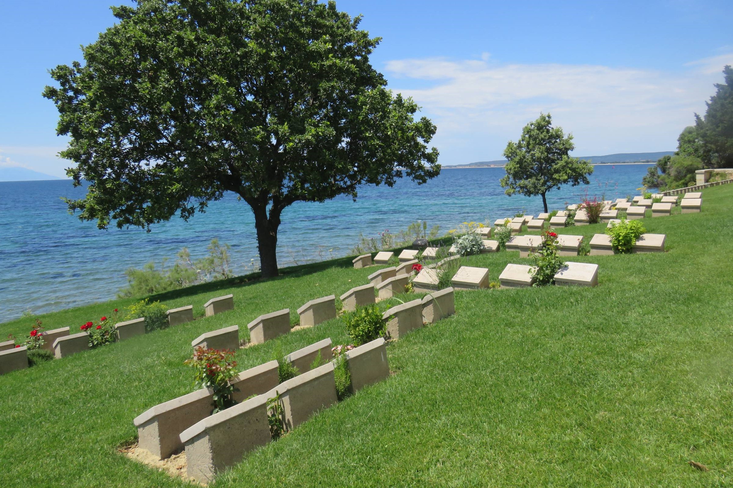 Beach Cemetery graves overlook the peaceful shores of the Gallipoli Peninsula, Turkey's historic coastline
