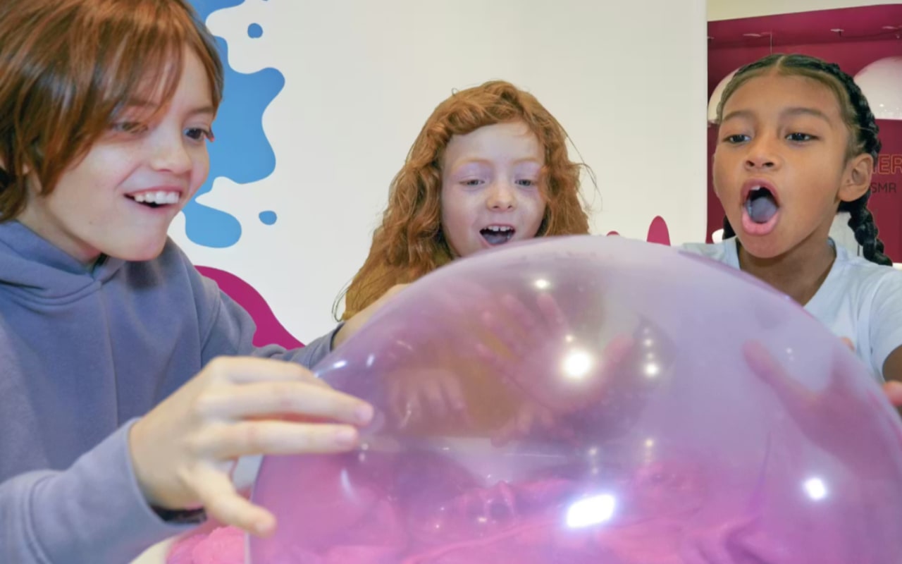 Explore a colorful slime playground filled with squishy textures and playful, hands-on interactive exhibits