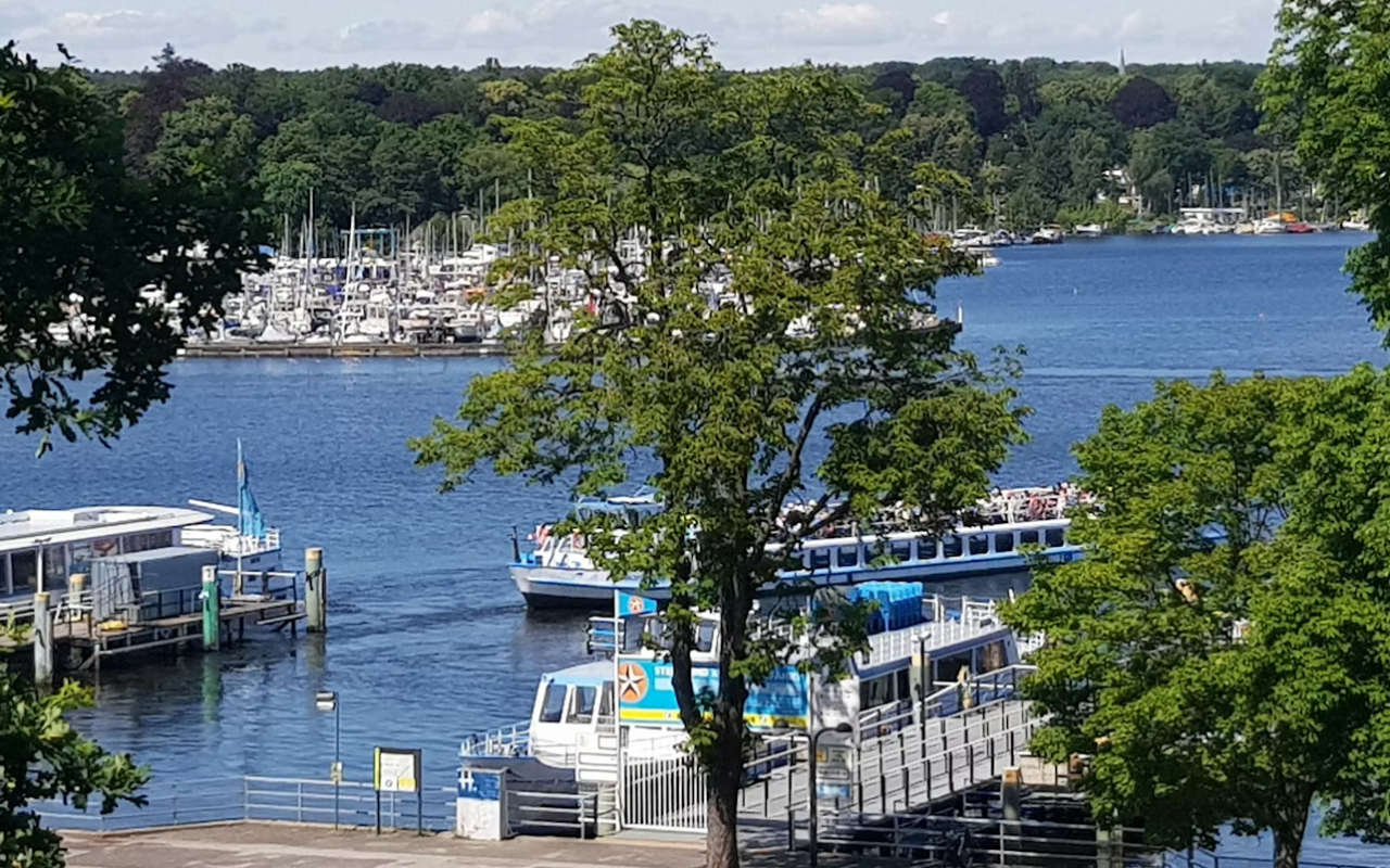 Glide past charming lakeside villas while enjoying the serene Havel waters