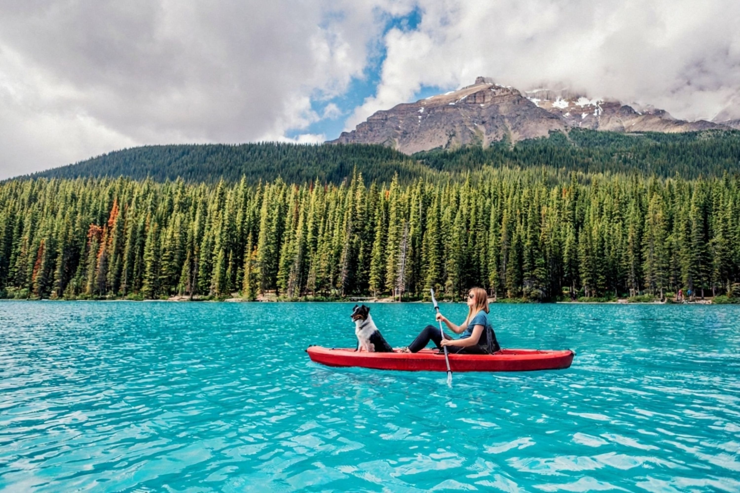 Kayaking across Moraine Lake reveals crystal waters and breathtaking alpine scenery