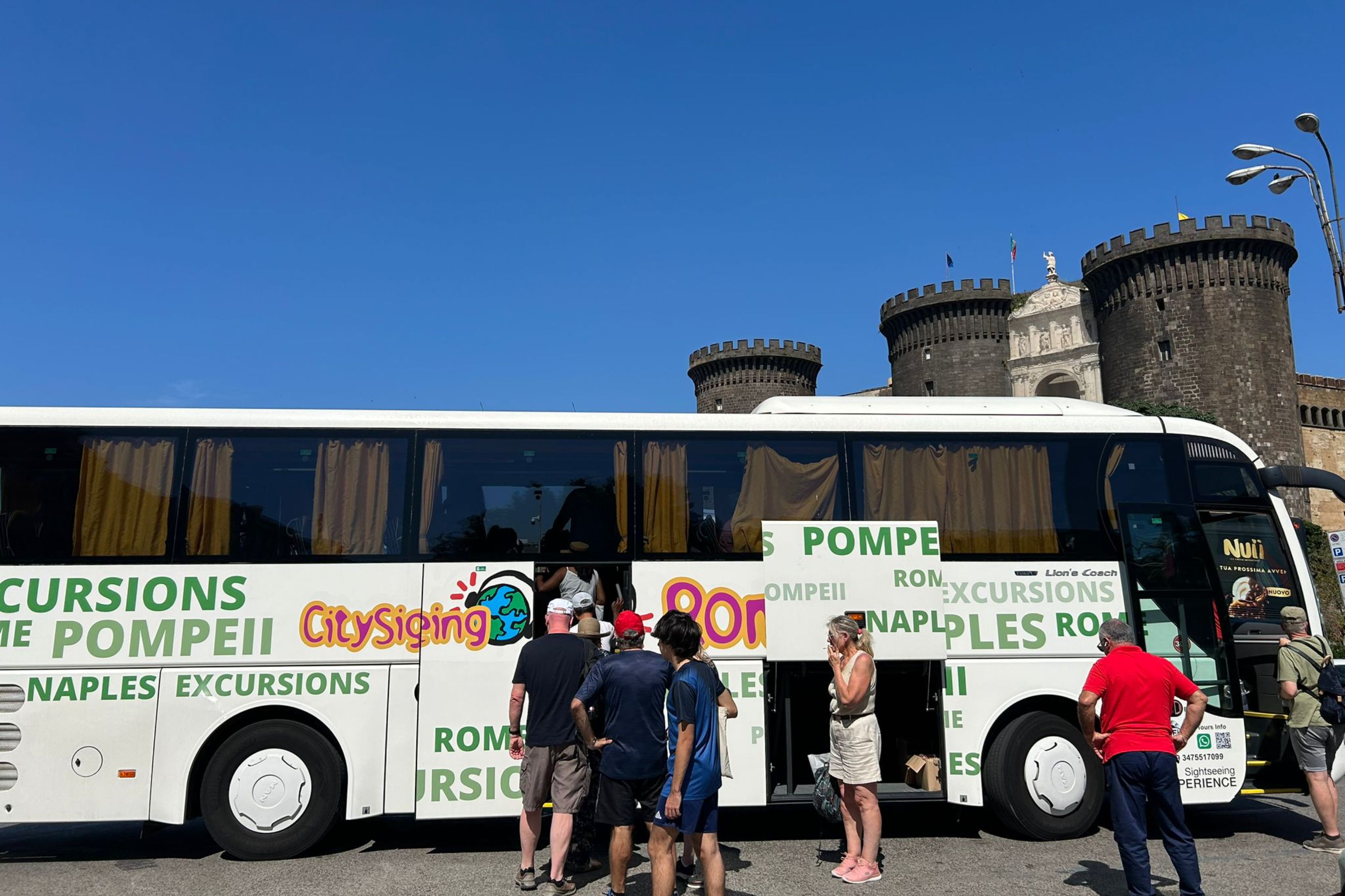 Travel effortlessly through Naples and Pompeii on a comfortable tour bus