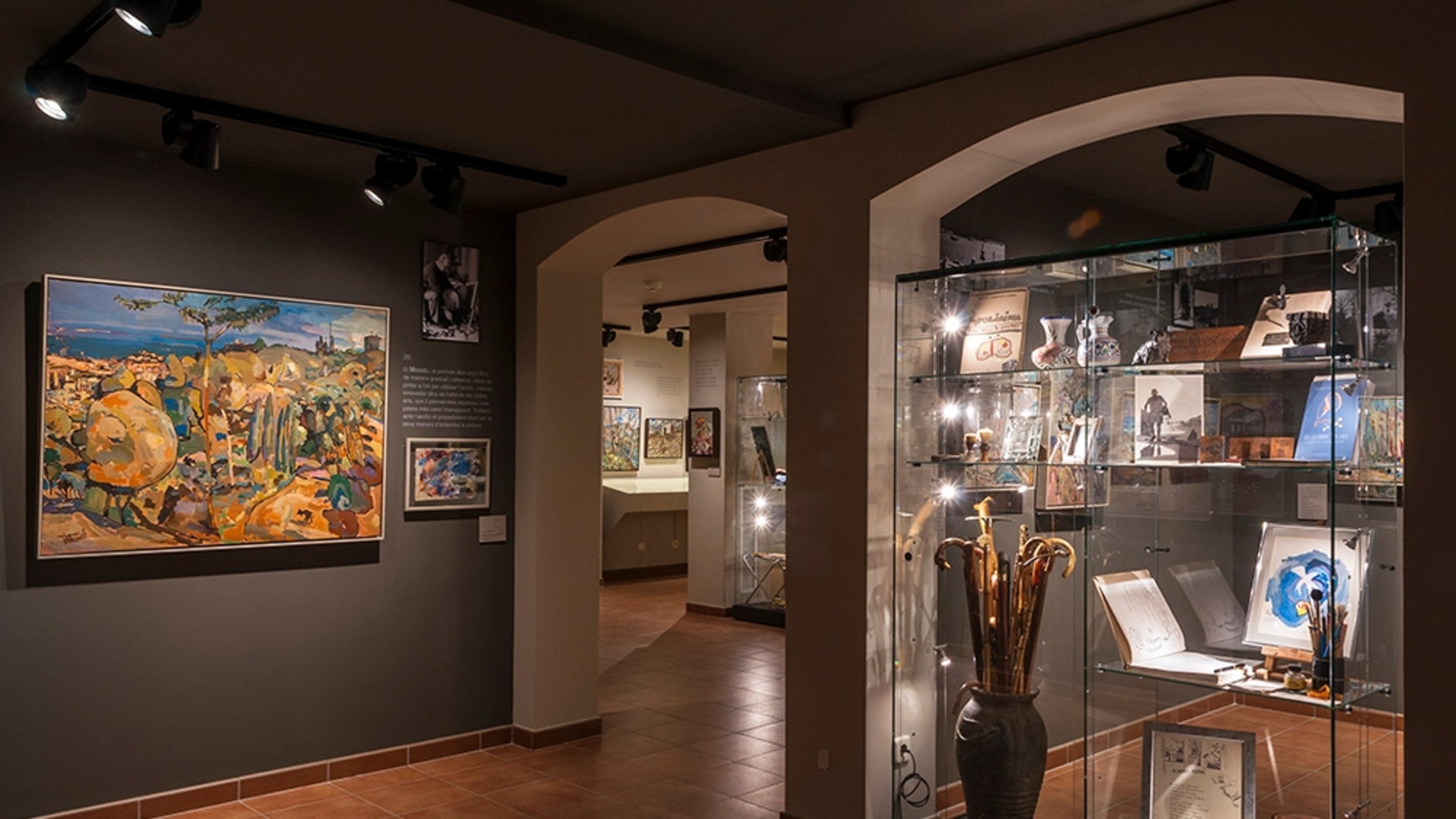 Museum interior blending modern exhibition design with preserved architectural charm and detailed artistic displays