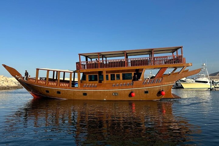 Dolphin Watching & Snorkeling on a Luxury Dhow Cruise