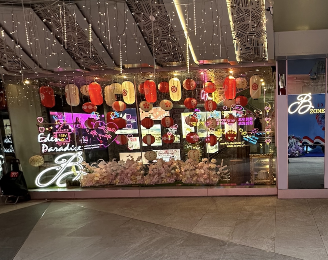 At the entrance of the building, head down the escalator on the left to the basement level. The shop is at the end of the corridor slanted diagonally to the right.