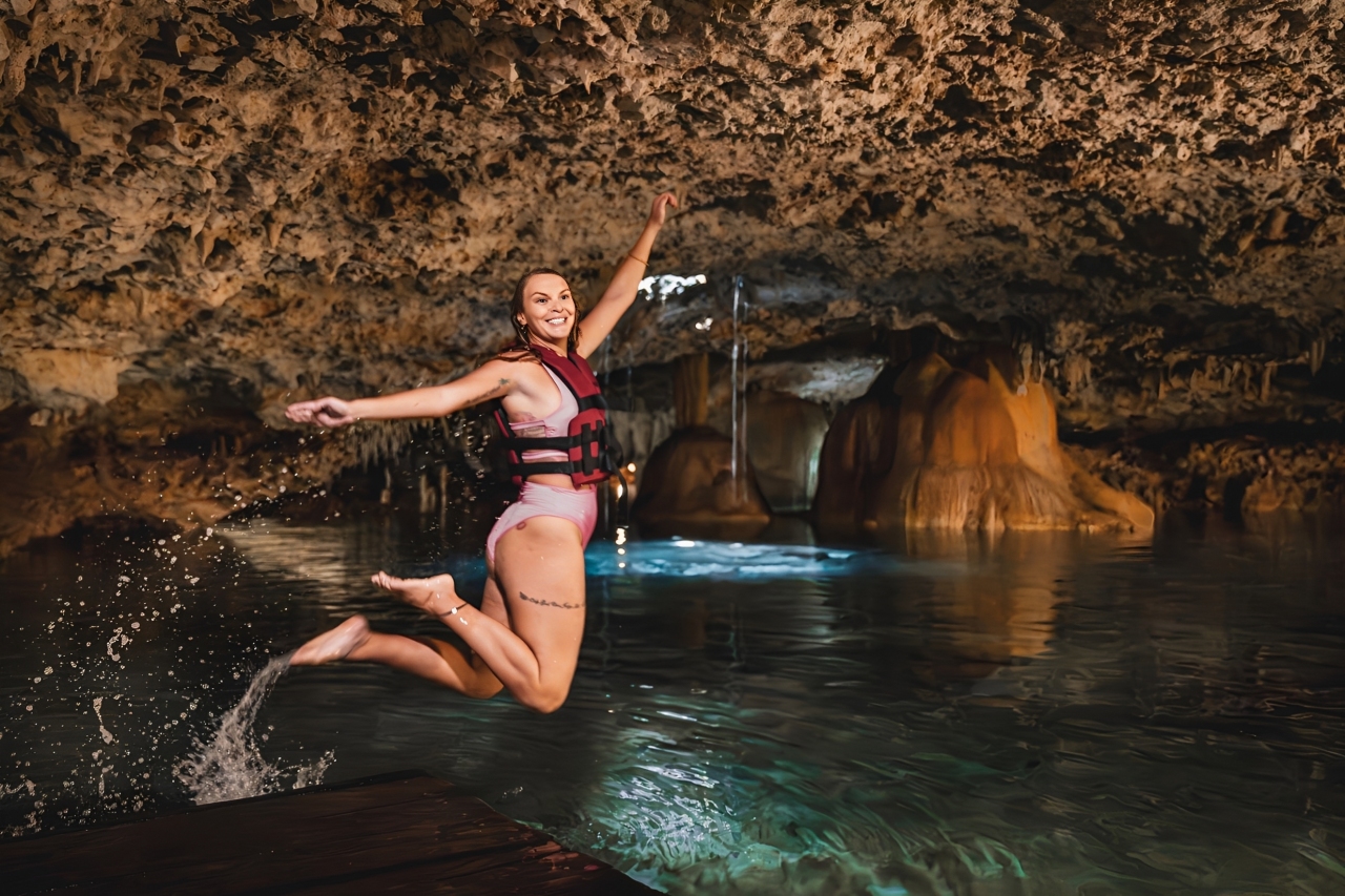 Group photo capturing smiles and adventure against Tulum’s picturesque backdrop