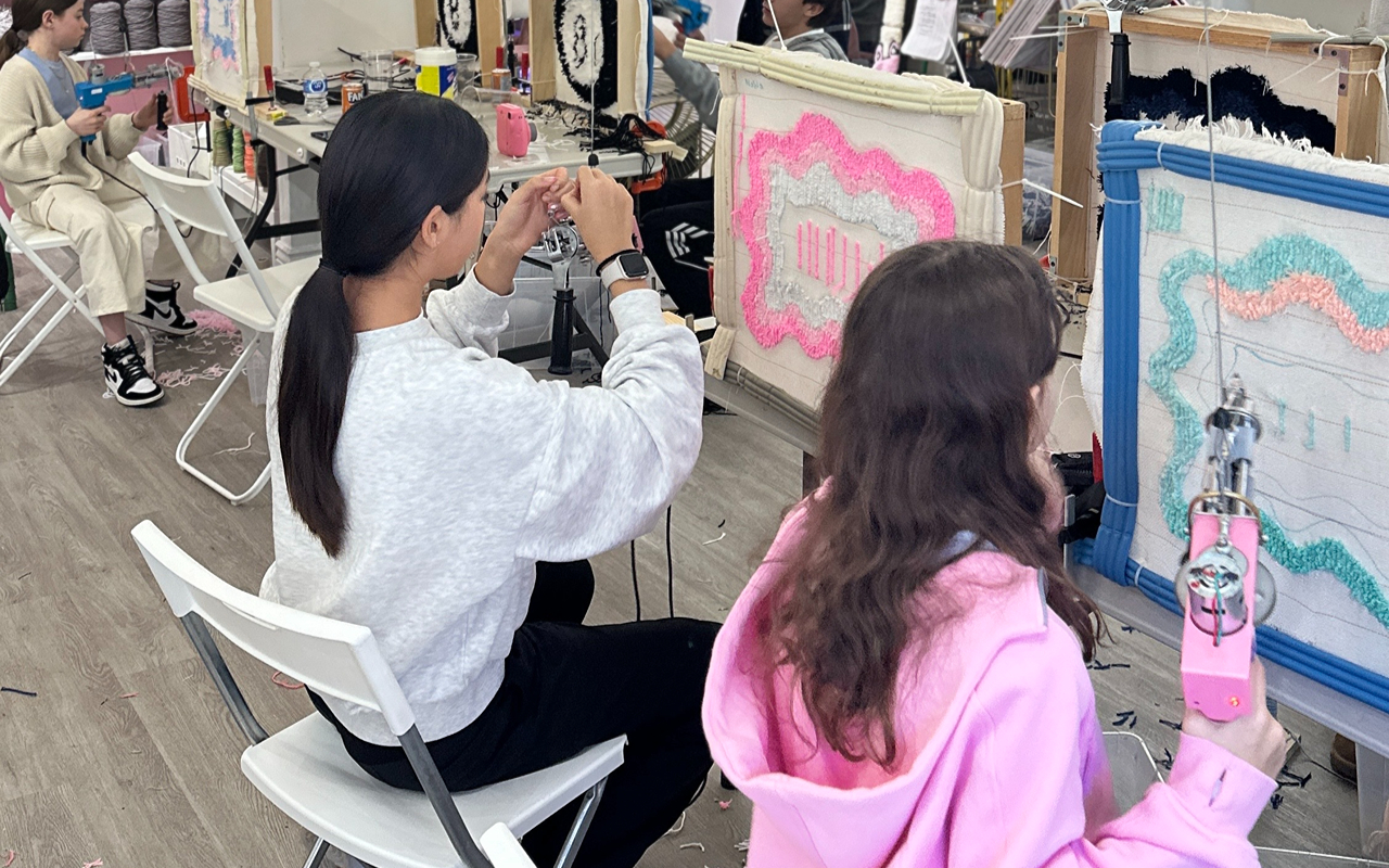 Creating vibrant designs and shared memories at our tufting workshop