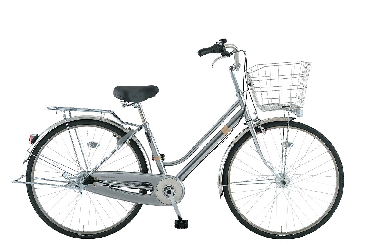 騎乘現代城市自行車,穿梭於古城的蜿蜒巷弄之間 騎乘現代城市自行車,穿梭於古城的蜿蜒巷弄之間