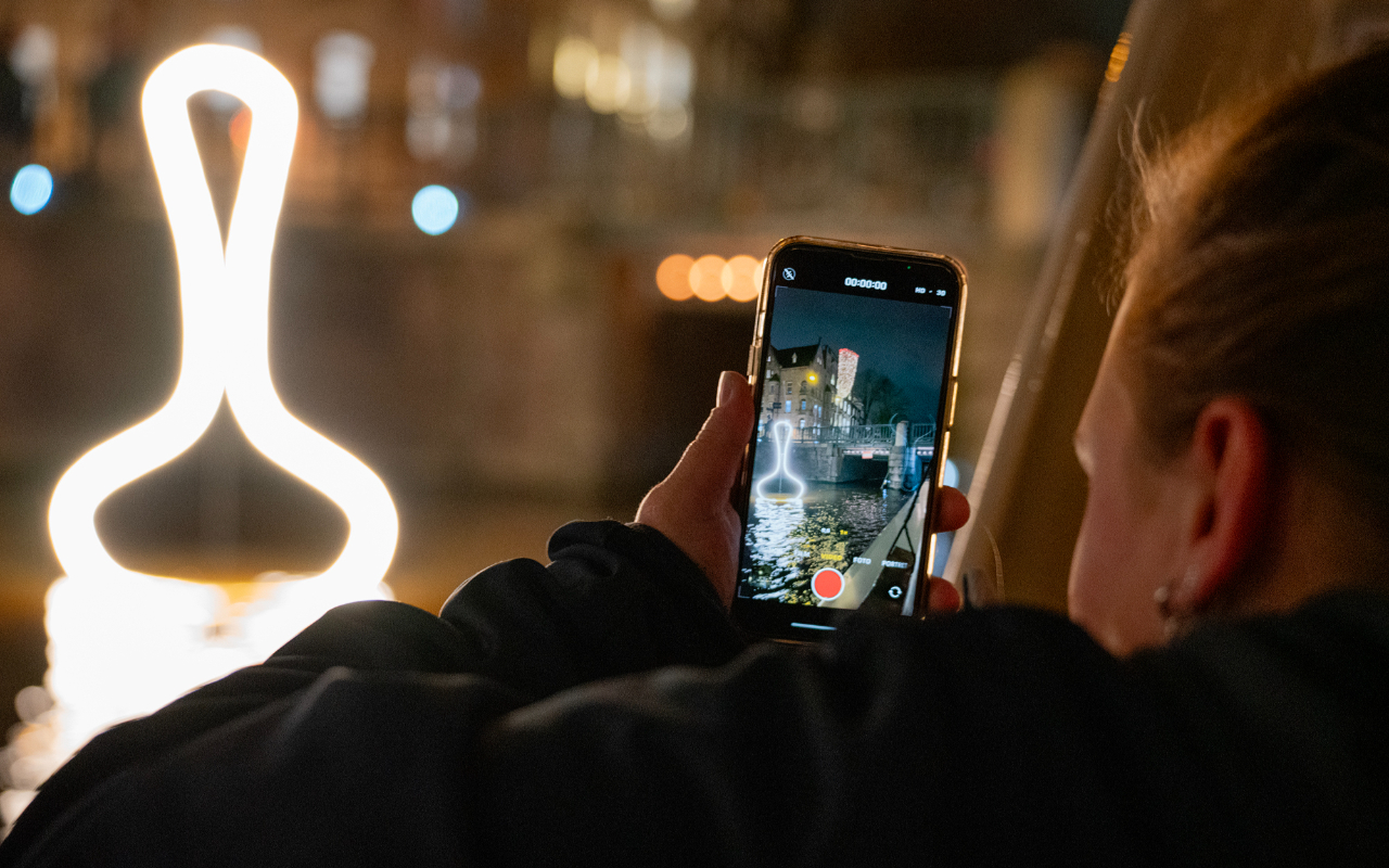 Sail past illuminated bridges and landmarks during the dazzling Amsterdam Light Festival