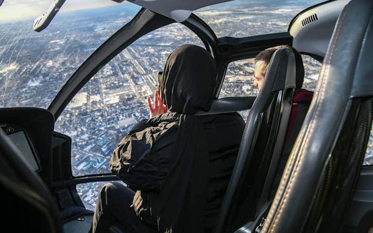 Enjoy breathtaking panoramic views of the landscape from the comfortable cabin of a modern helicopter