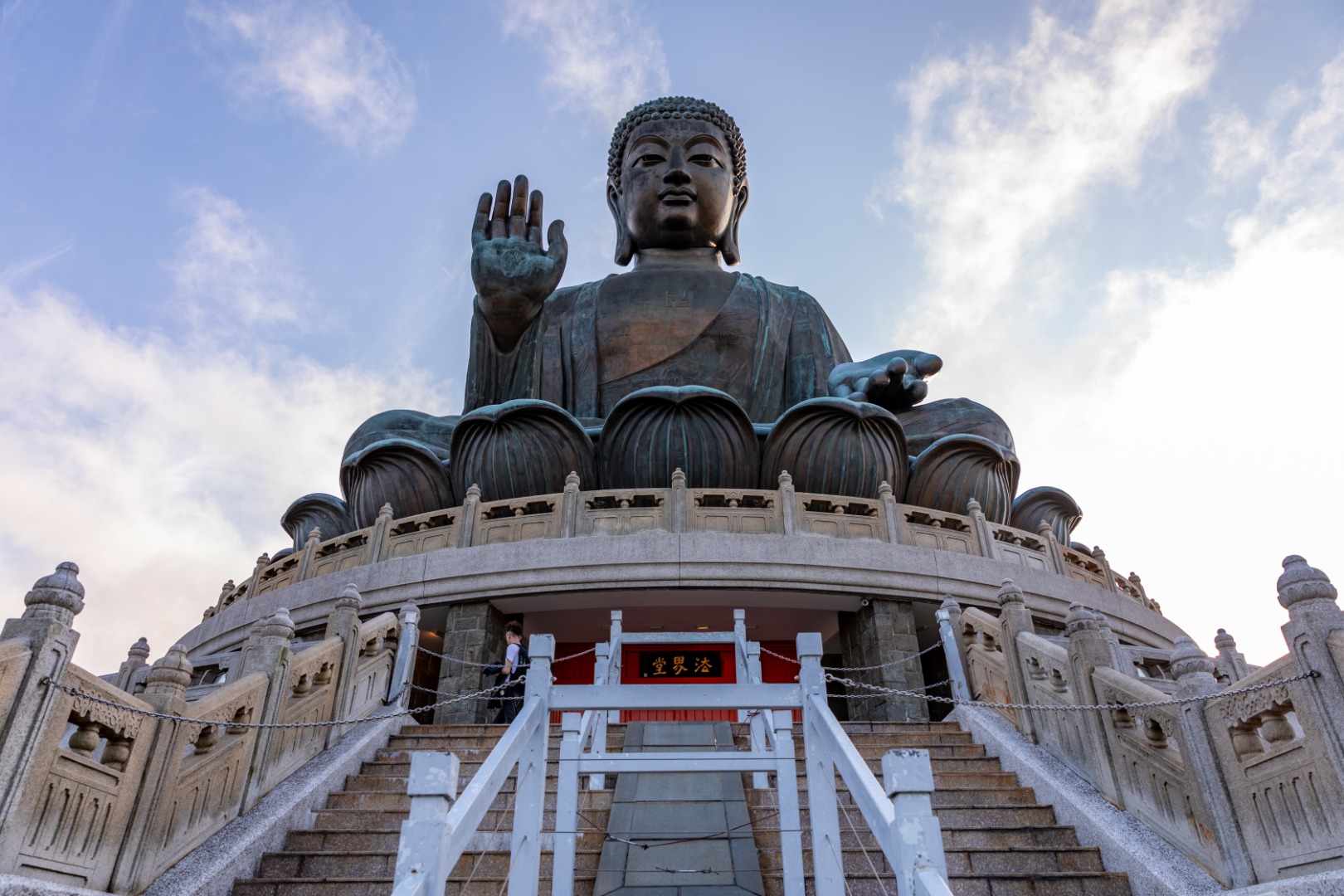 Experience sceneries like no other on your way up to the foot of the iconic big Buddha statue, Tian Tan Buddha