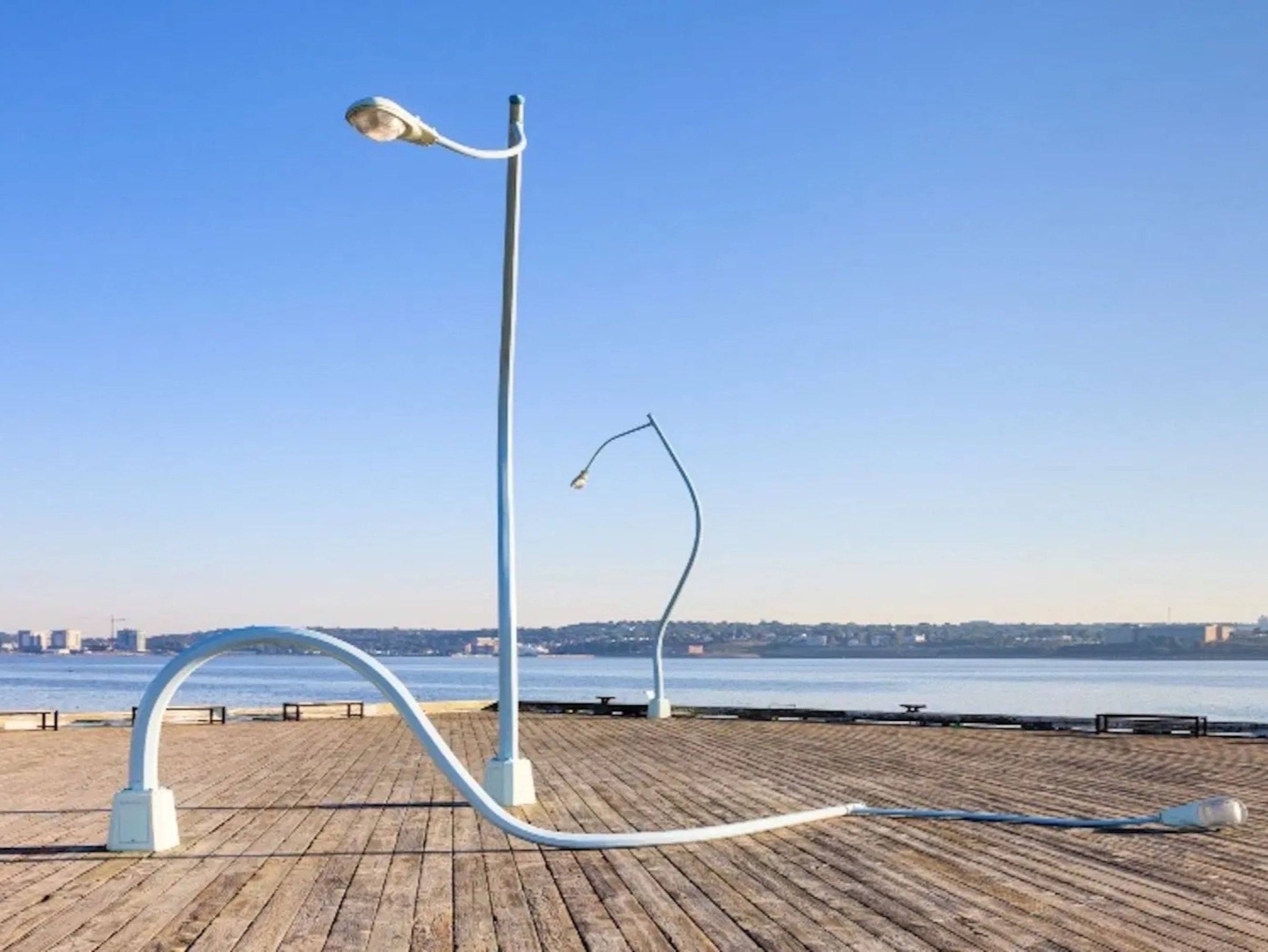 Capture a photo with ‘The Wave,’ one of Halifax’s most iconic public artworks, set against panoramic views of the harbor