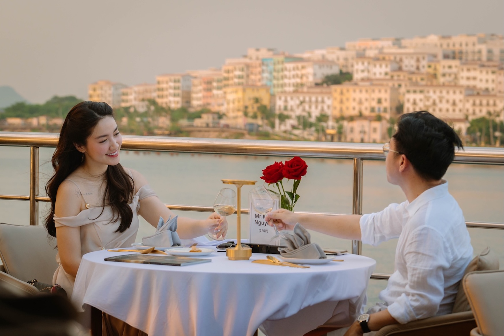 See the beautiful islands South and town glowing with sunset light from 5-star cruise ship Nautilus