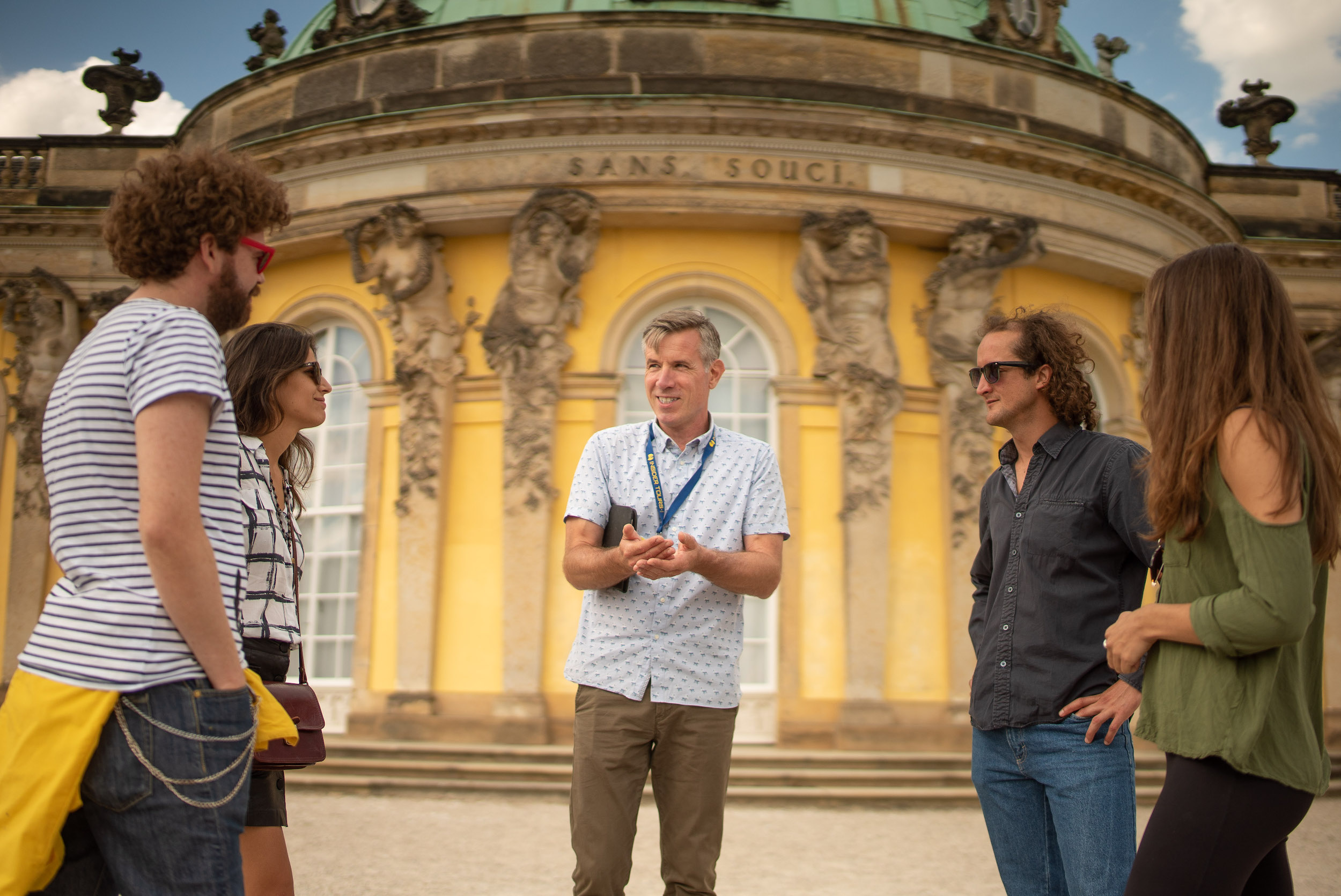 Guide and group atSanssouci palace