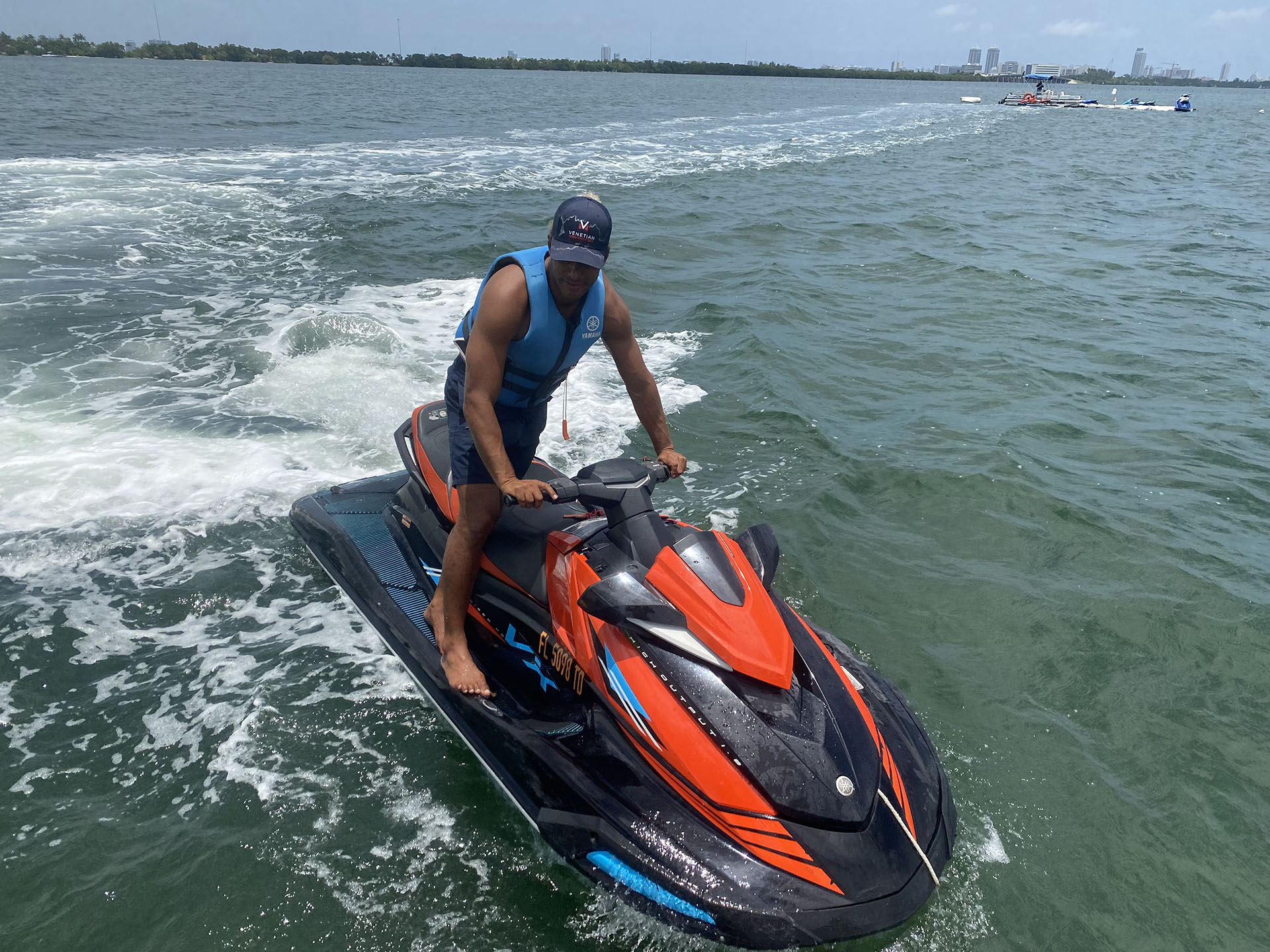 Speed across the bay solo on a jet ski for unmatched coastal excitement